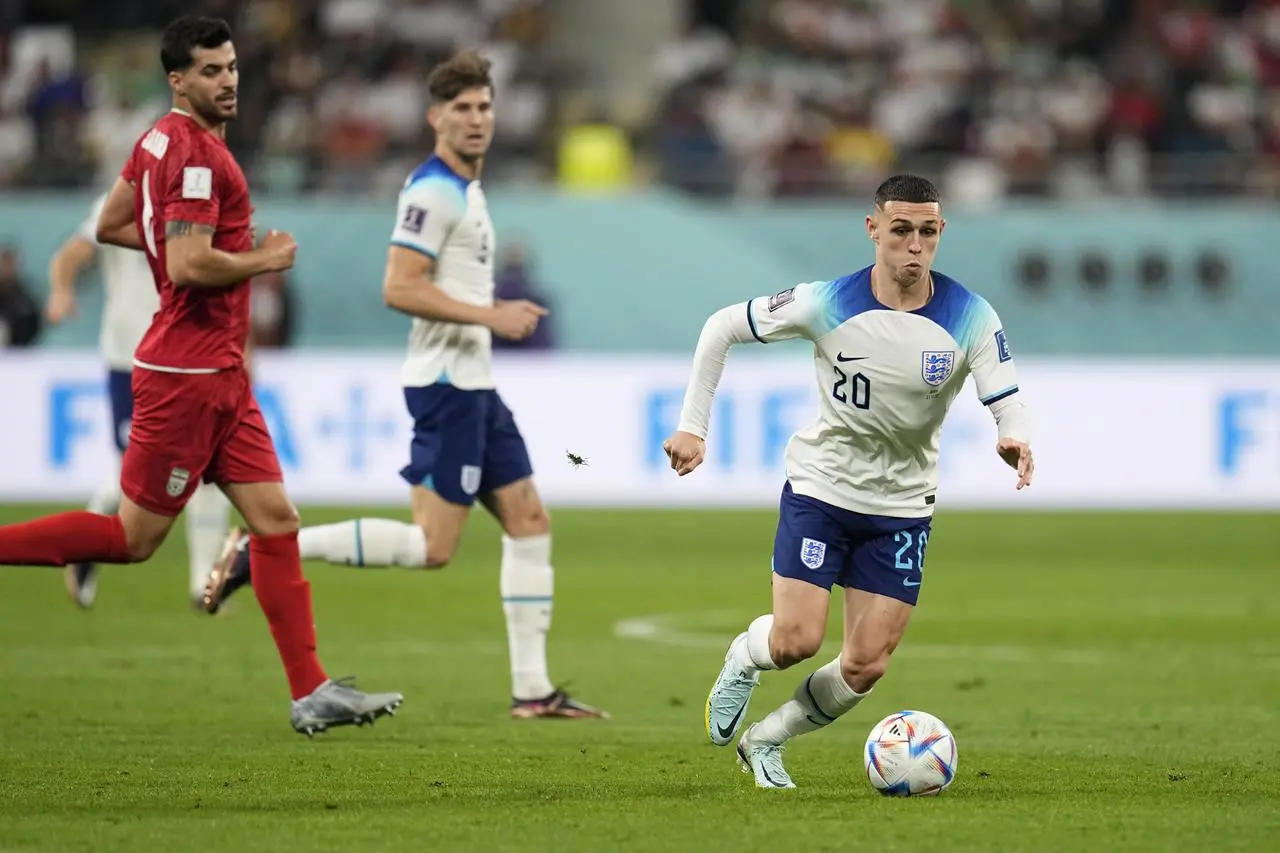 Phil Foden (right) will be pushing to start against the United States.