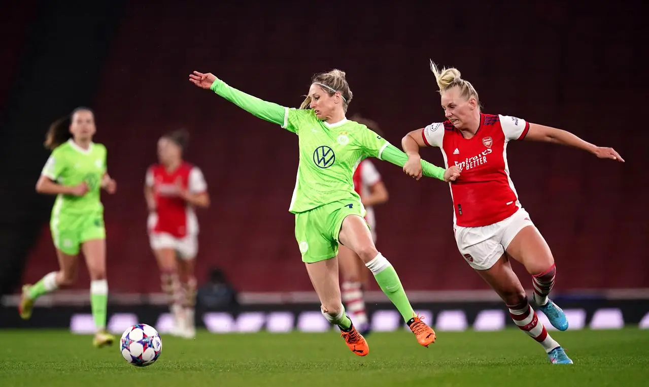 Wolfsburg’s Kathrin-Julia Hendrich (left) and Arsenal’s Stina Blackstenius battle for the ball (John Walton/PA)
