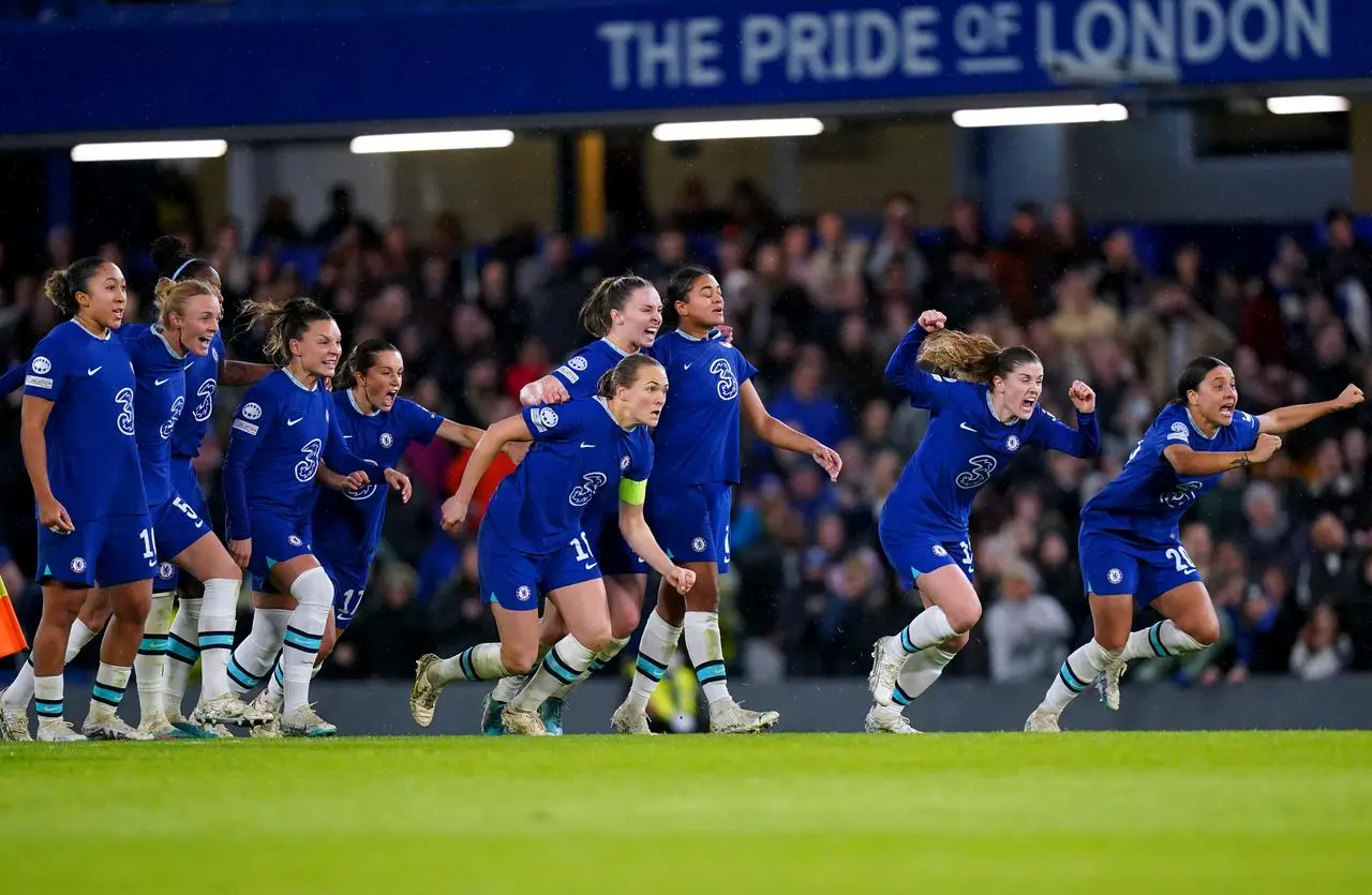 Chelsea players celebrate after beating Lyon on penalties (Adam Davy/PA)