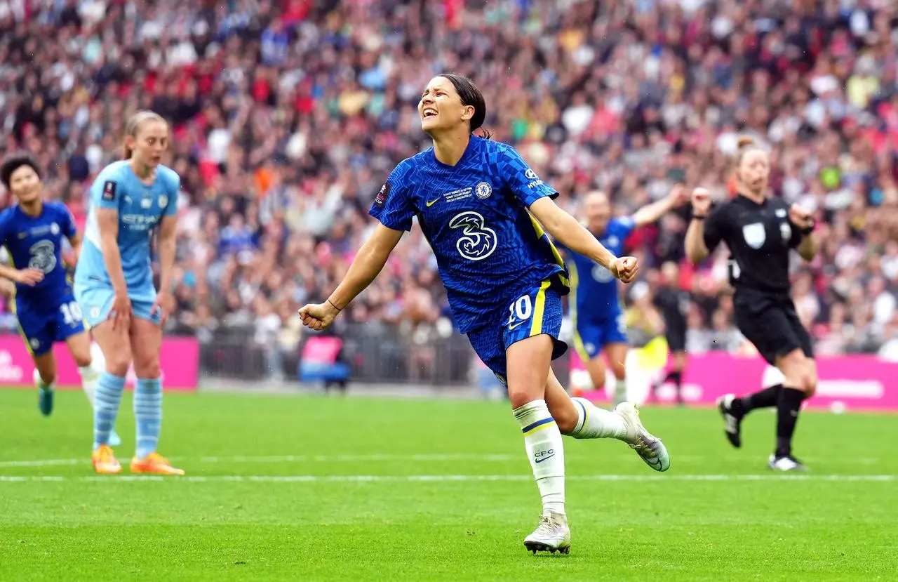 Sam Kerr celebrates her second goal, an extra-time winner, in the final against City