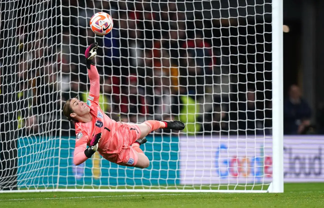 Manchester United goalkeeper Mary Earps saves a penalty in the Women’s Finalissima against Brazil at Wembley