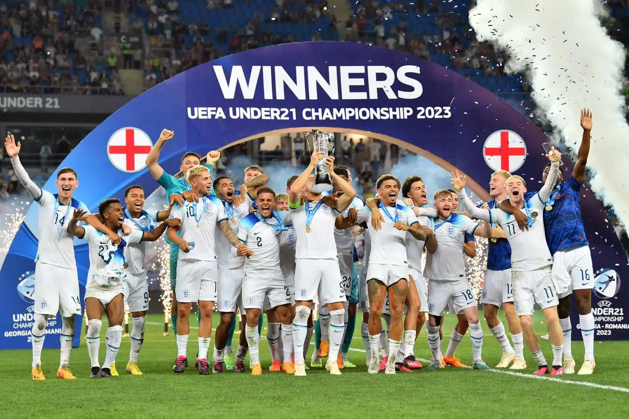 England players celebrate with the trophy following the Euro Under-21 Championship final in Georgia