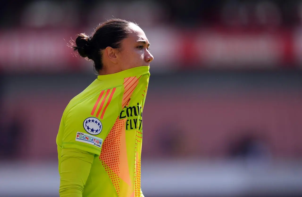 Arsenal goalkeeper Manuela Zinsberger reacts after their defeat by Lyon