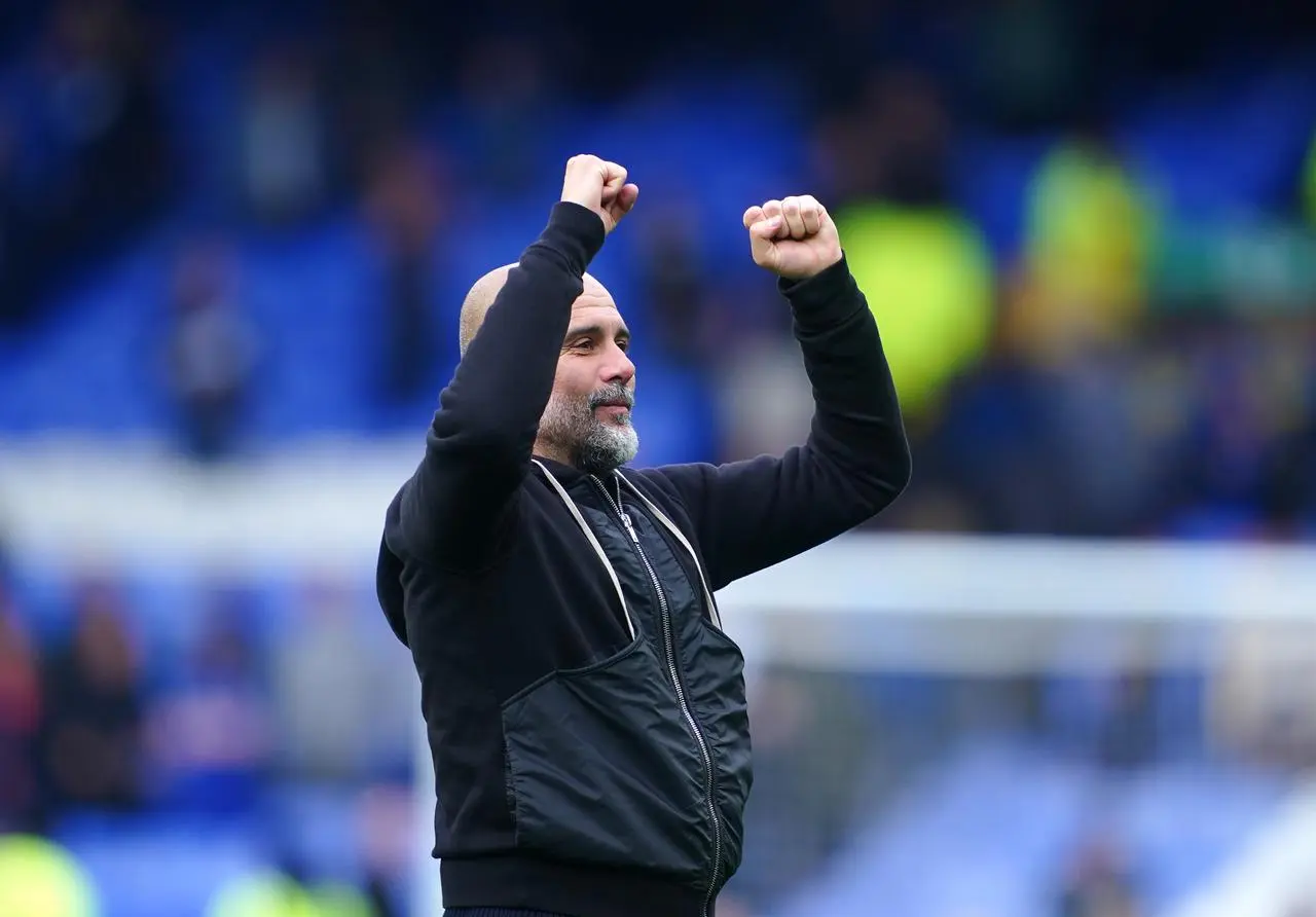 Pep Guardiola reacts after Manchester City's win over Everton