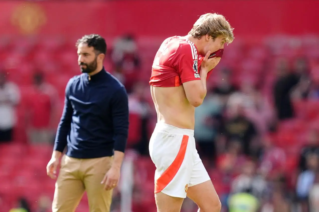 Manchester United’s Rasmus Hojlund and manager Ruben Amorim react after a Premier League match at Old Trafford