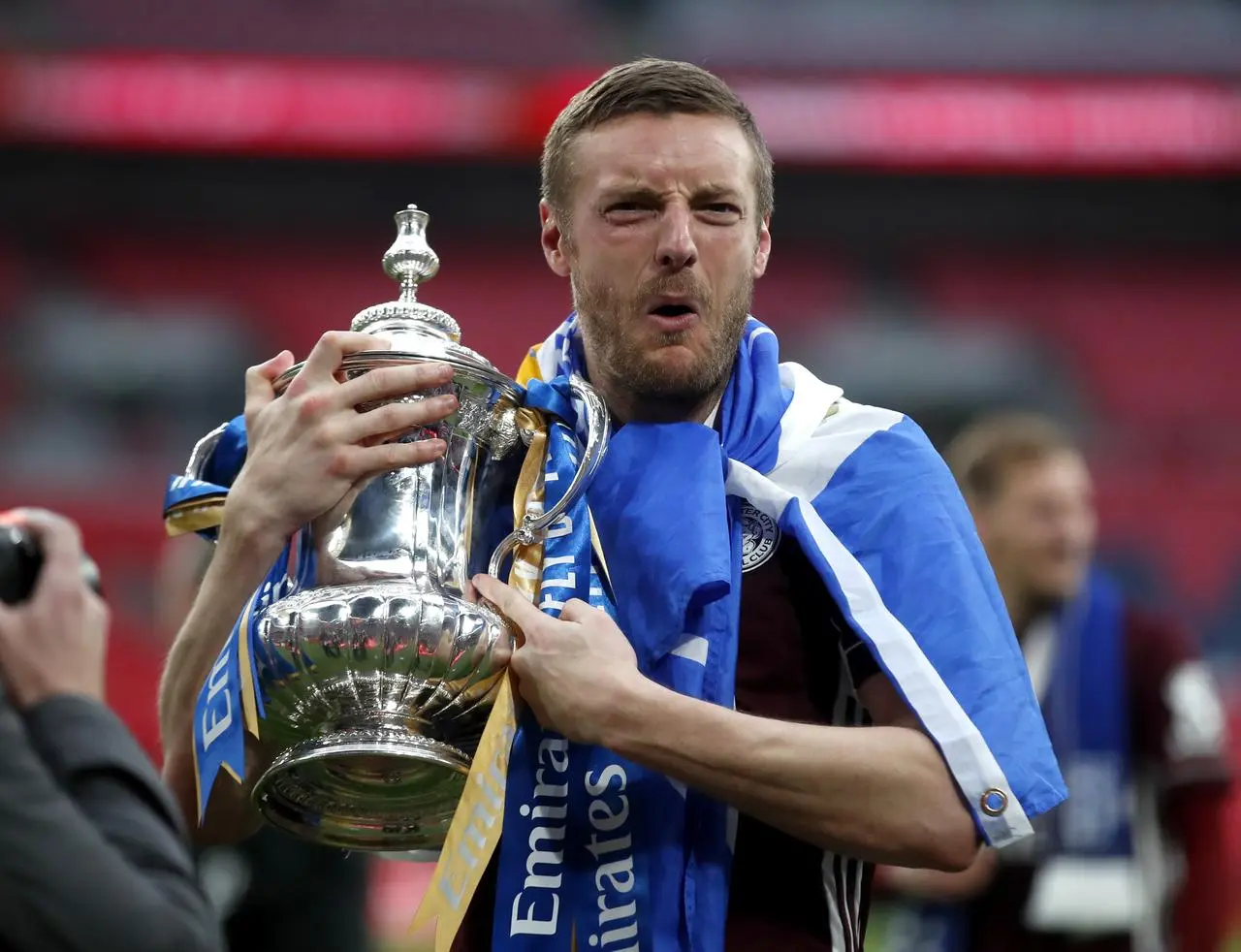 Leicester City’s Jamie Vardy celebrates with the 2021 FA Cup trophy
