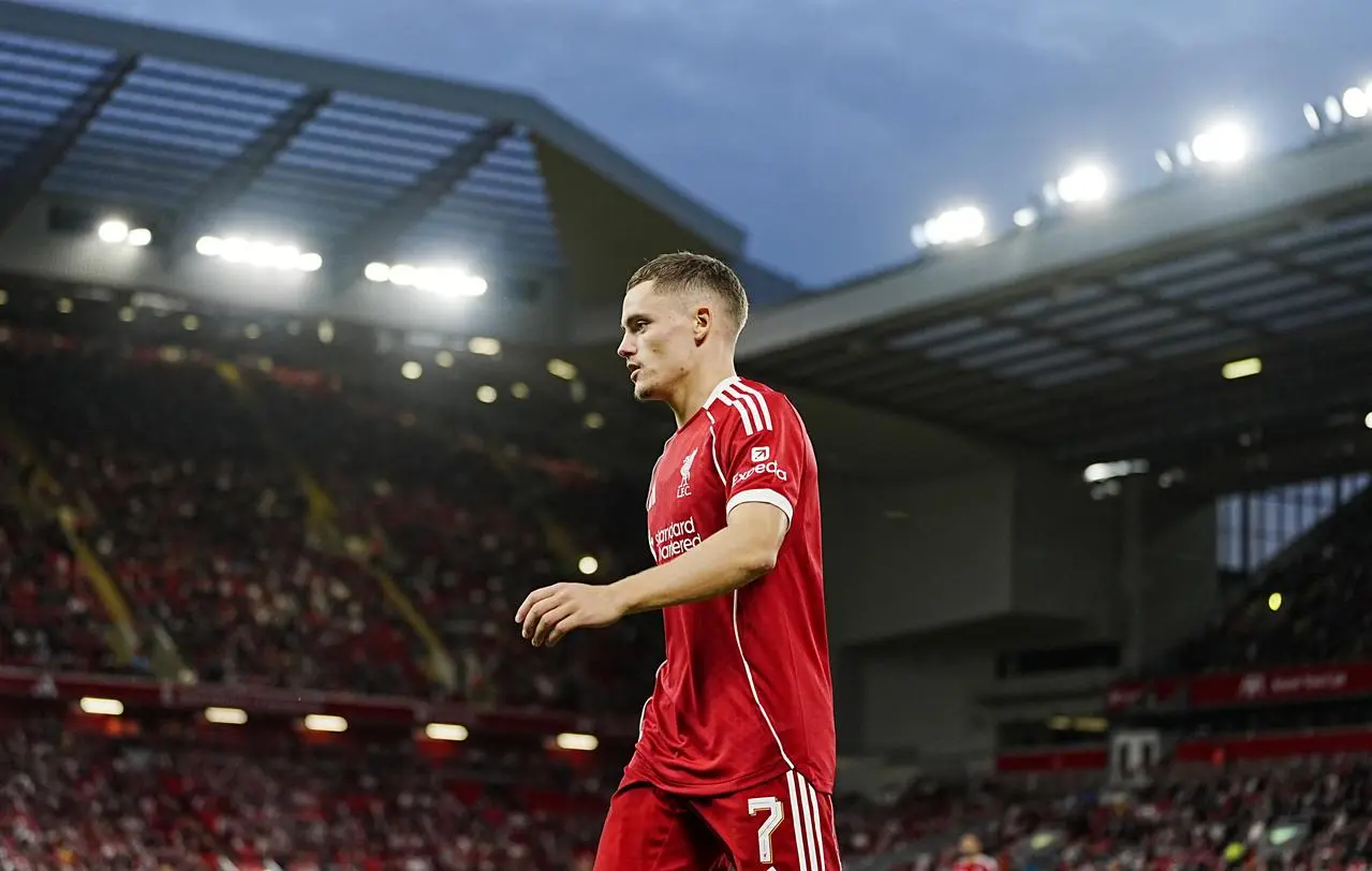 Liverpool's Florian Wirtz with Anfield's stands in the background
