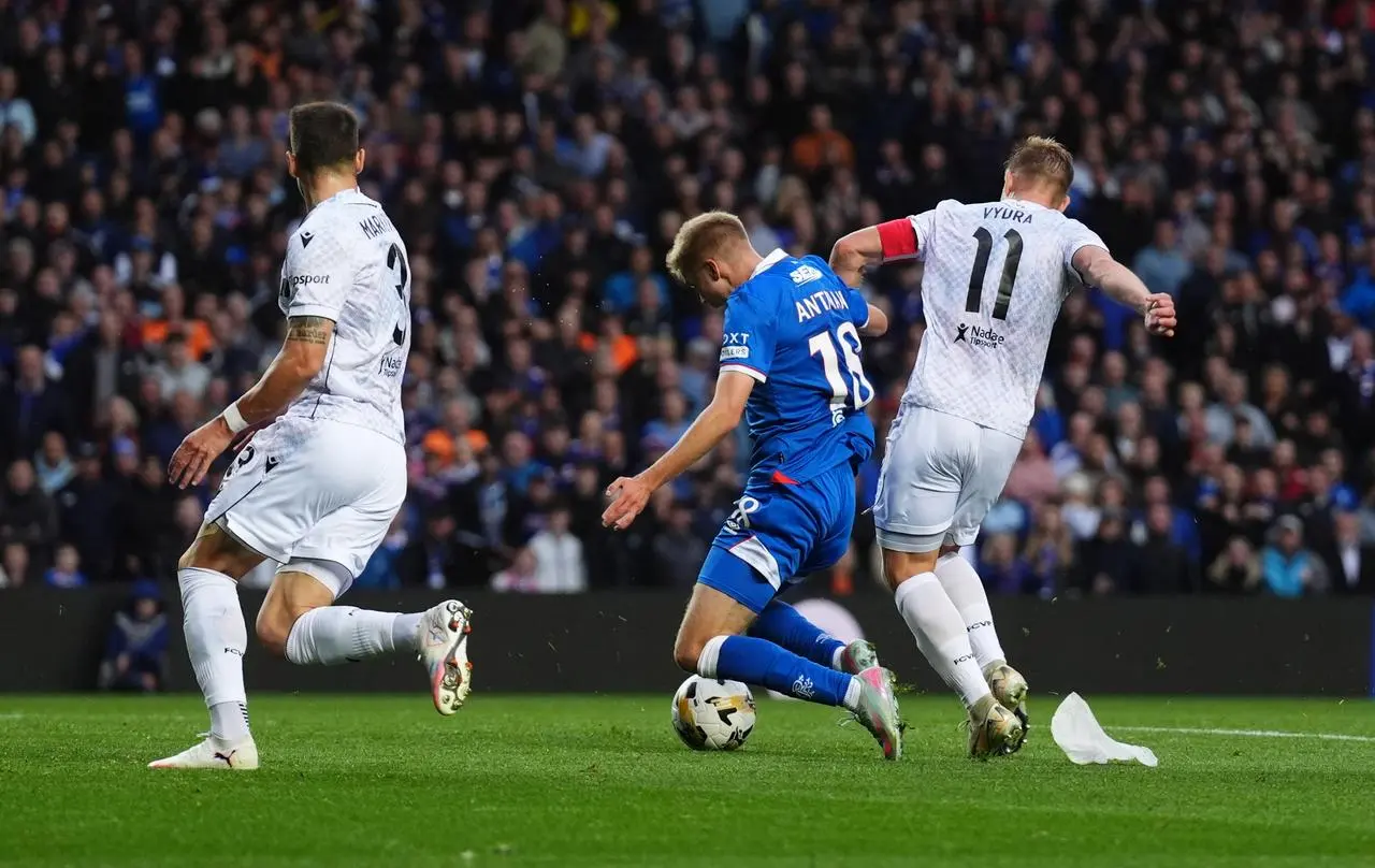 Oliver Antman is fouled by Viktoria Plzen's Matej Vydra, left, leading to a Rangers penalty