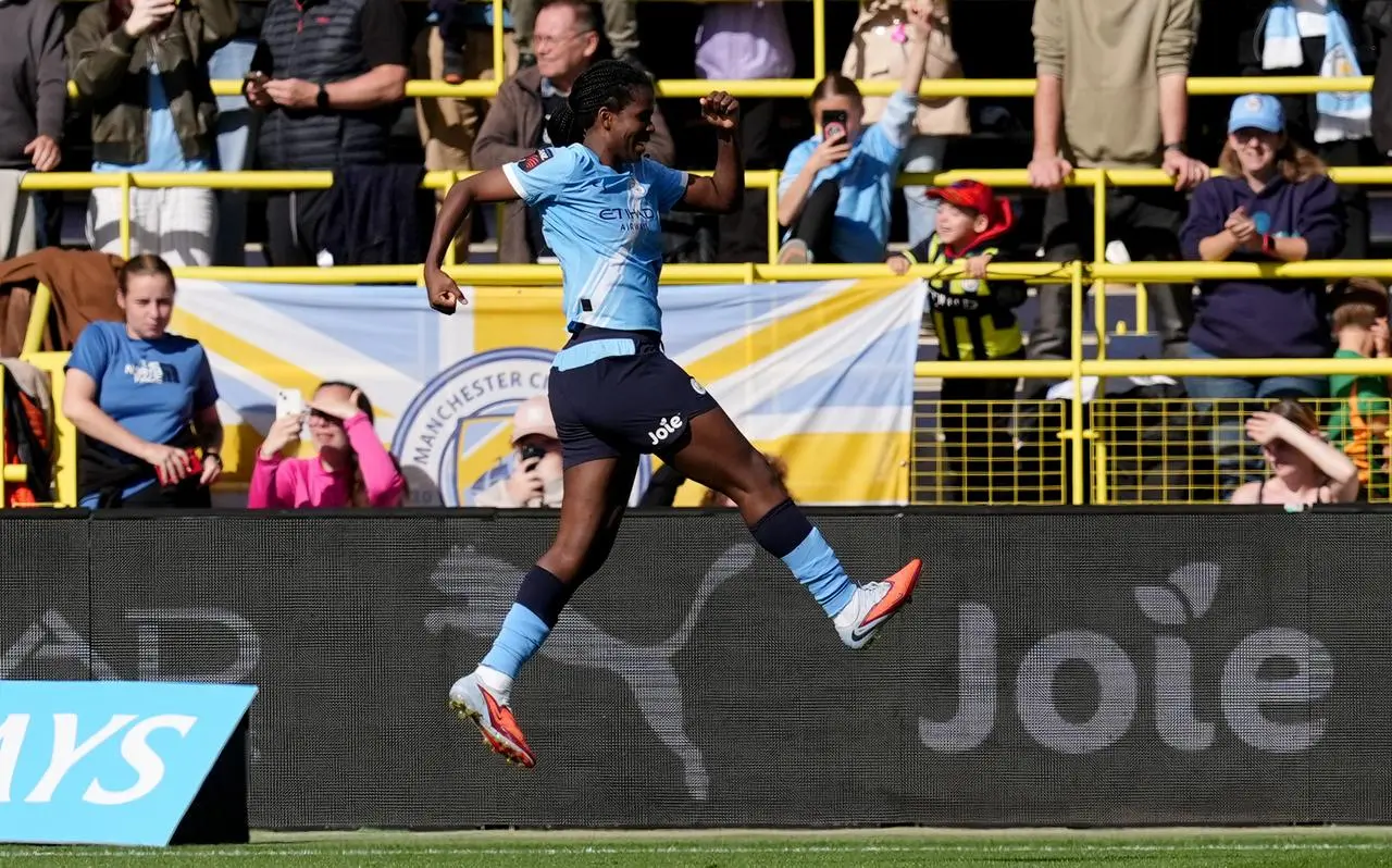 Manchester City’s Khadija Shaw celebrates after scoring in the Women’s Super League match