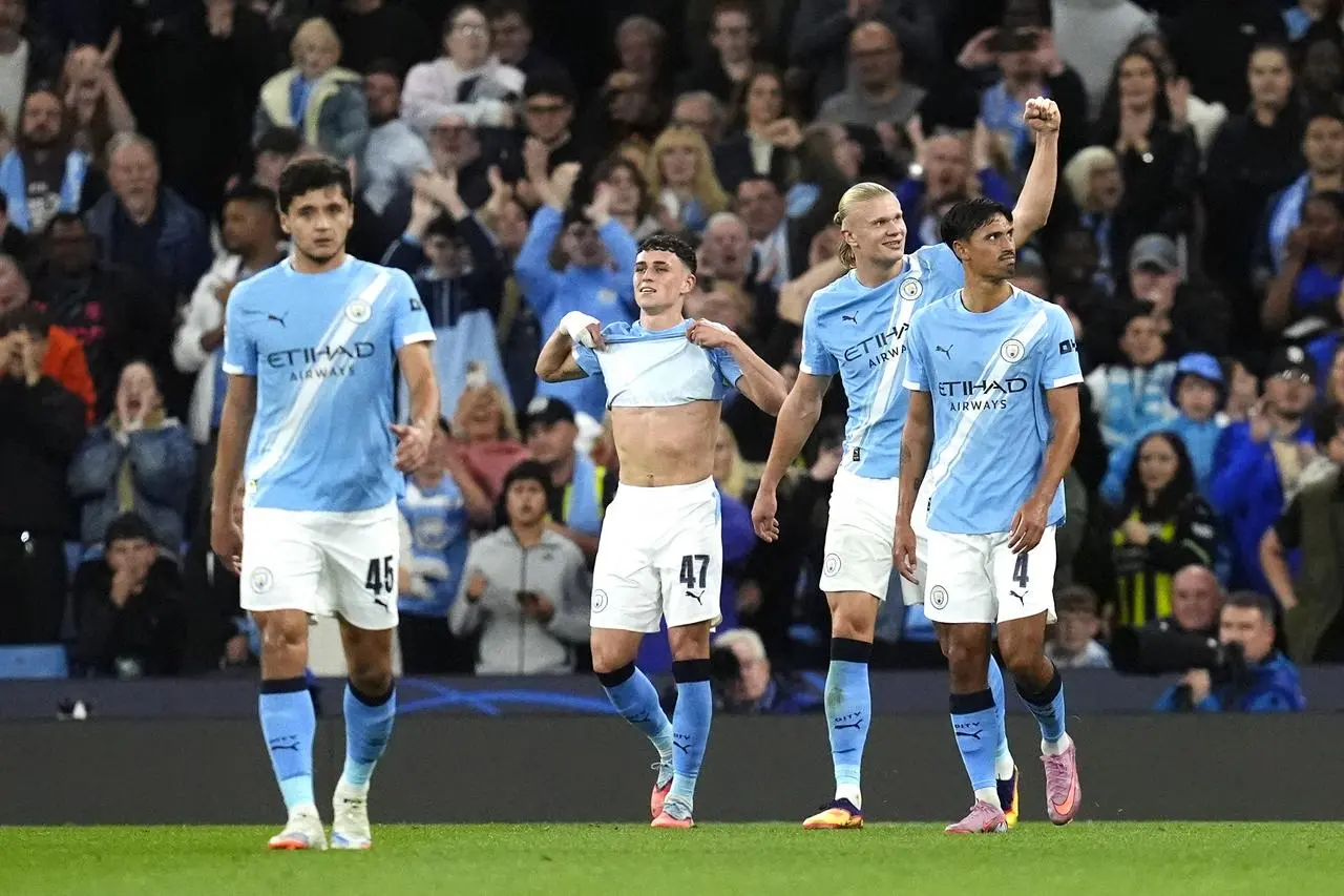 Haaland (second right) celebrates his goal