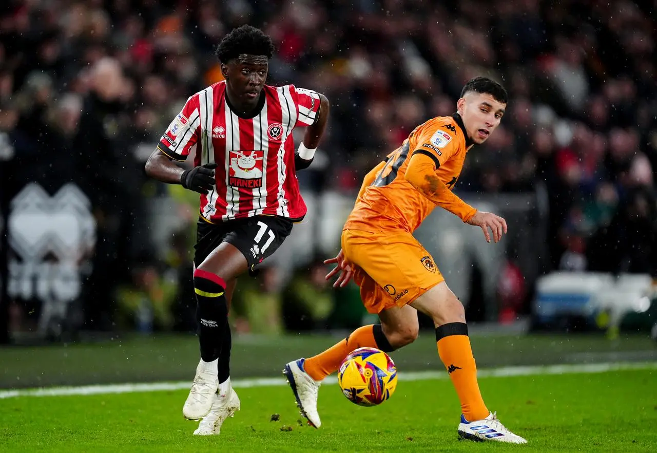 Jesurun Rak-Sakyi runs with the ball during a loan spell with Sheffield United