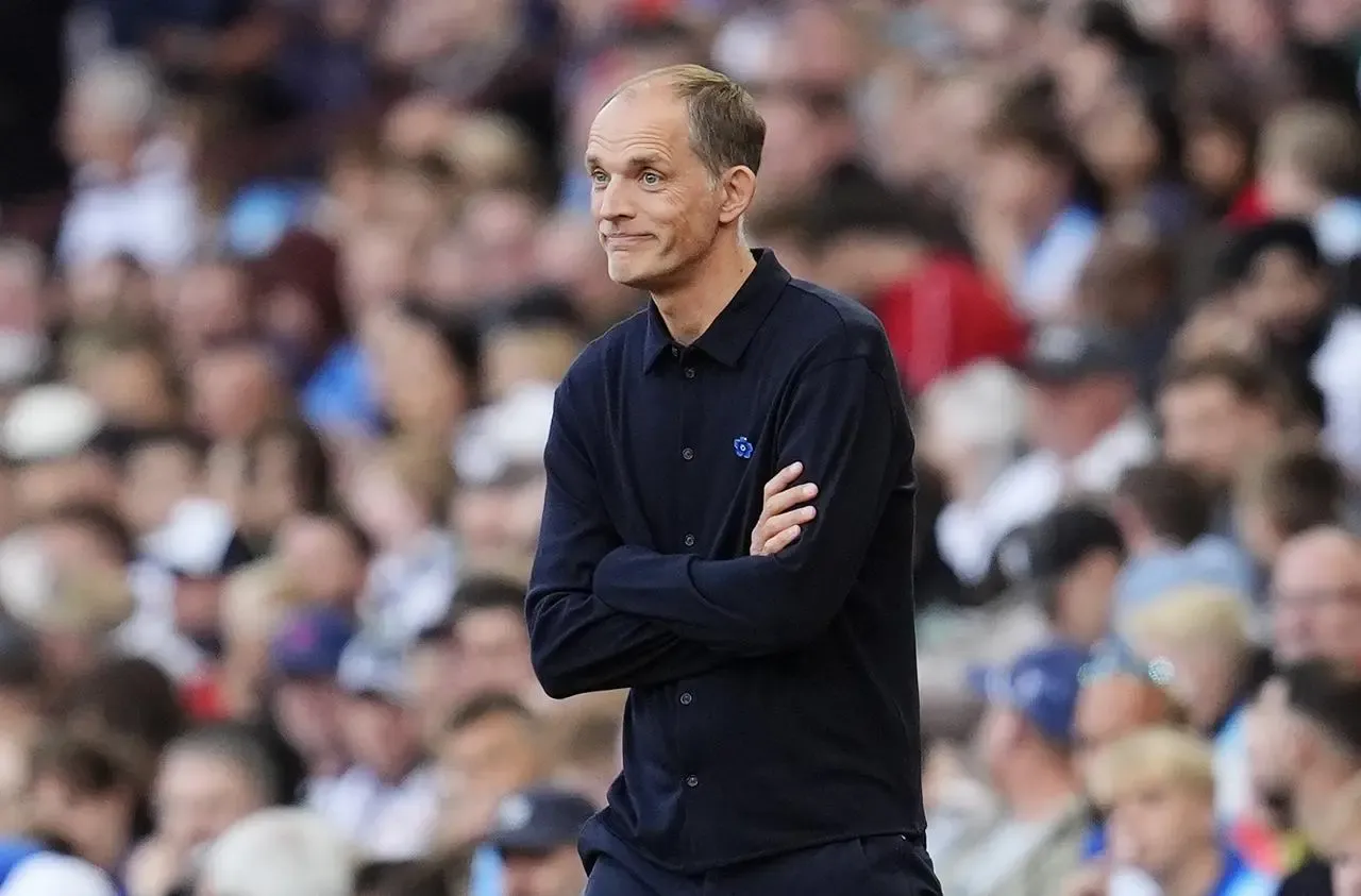 England head coach Thomas Tuchel stands with arms folded