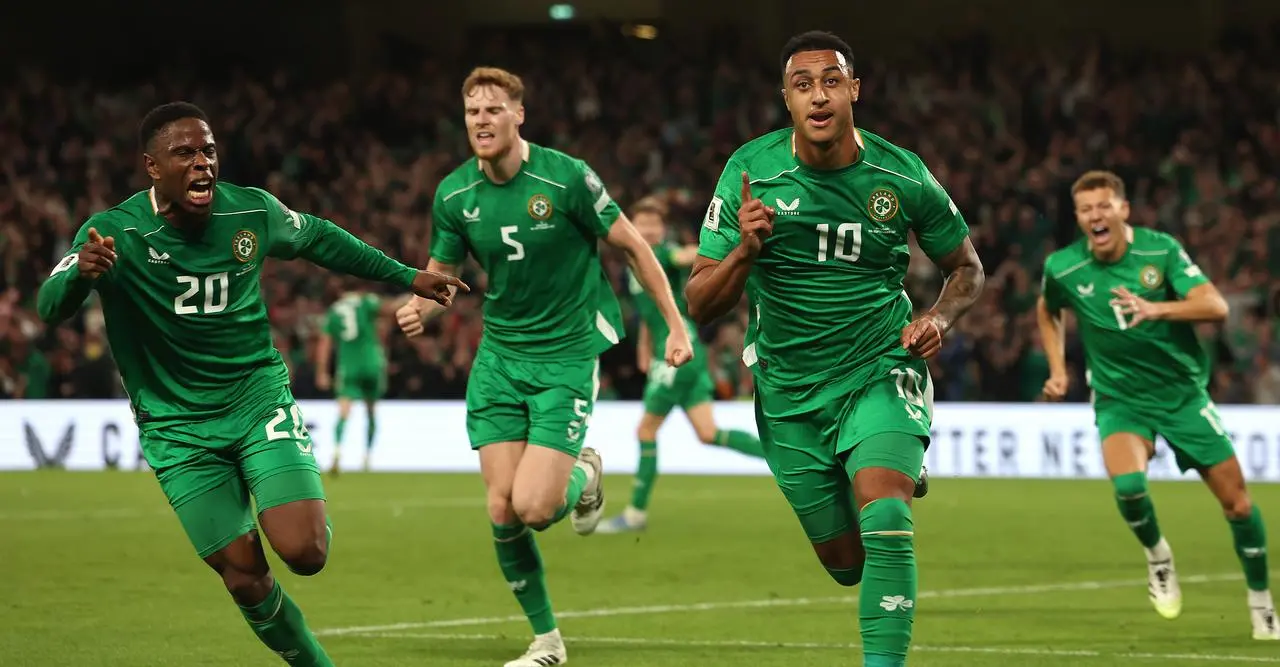 Republic of Ireland’s Adam Idah celebrates in front of his Republic of Ireland team-mates