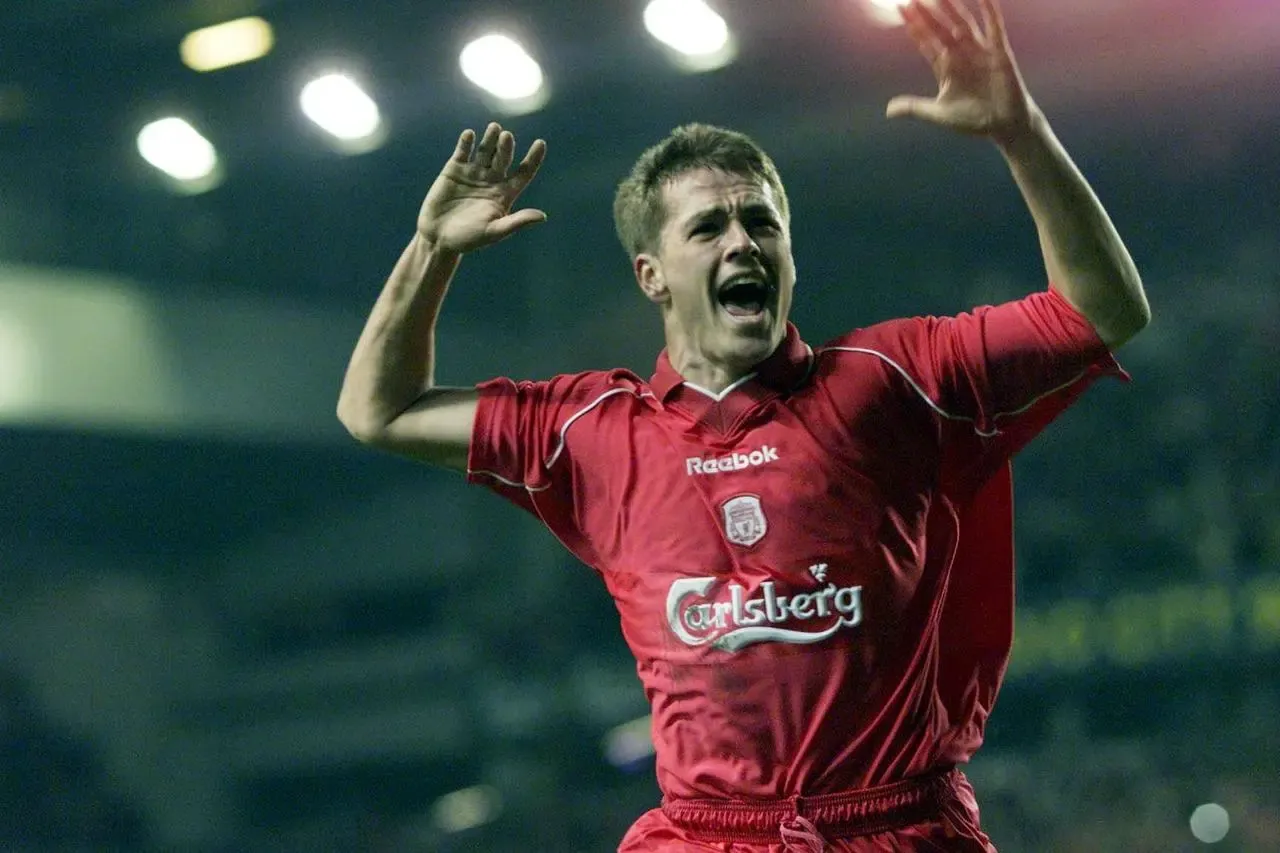 Michael Owen celebrates scoring a goal for Liverpool at Anfield