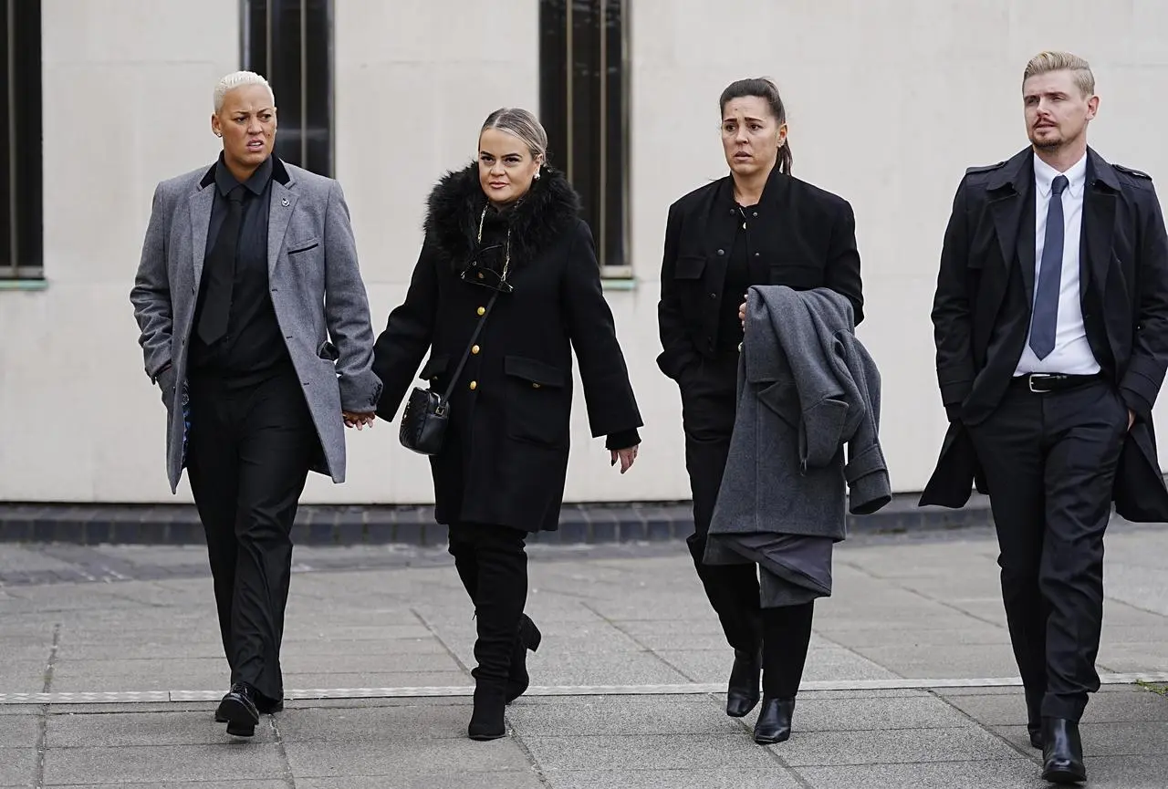 Lianne Sanderson (left) and Fara Williams (second right) arriving at the memorial service