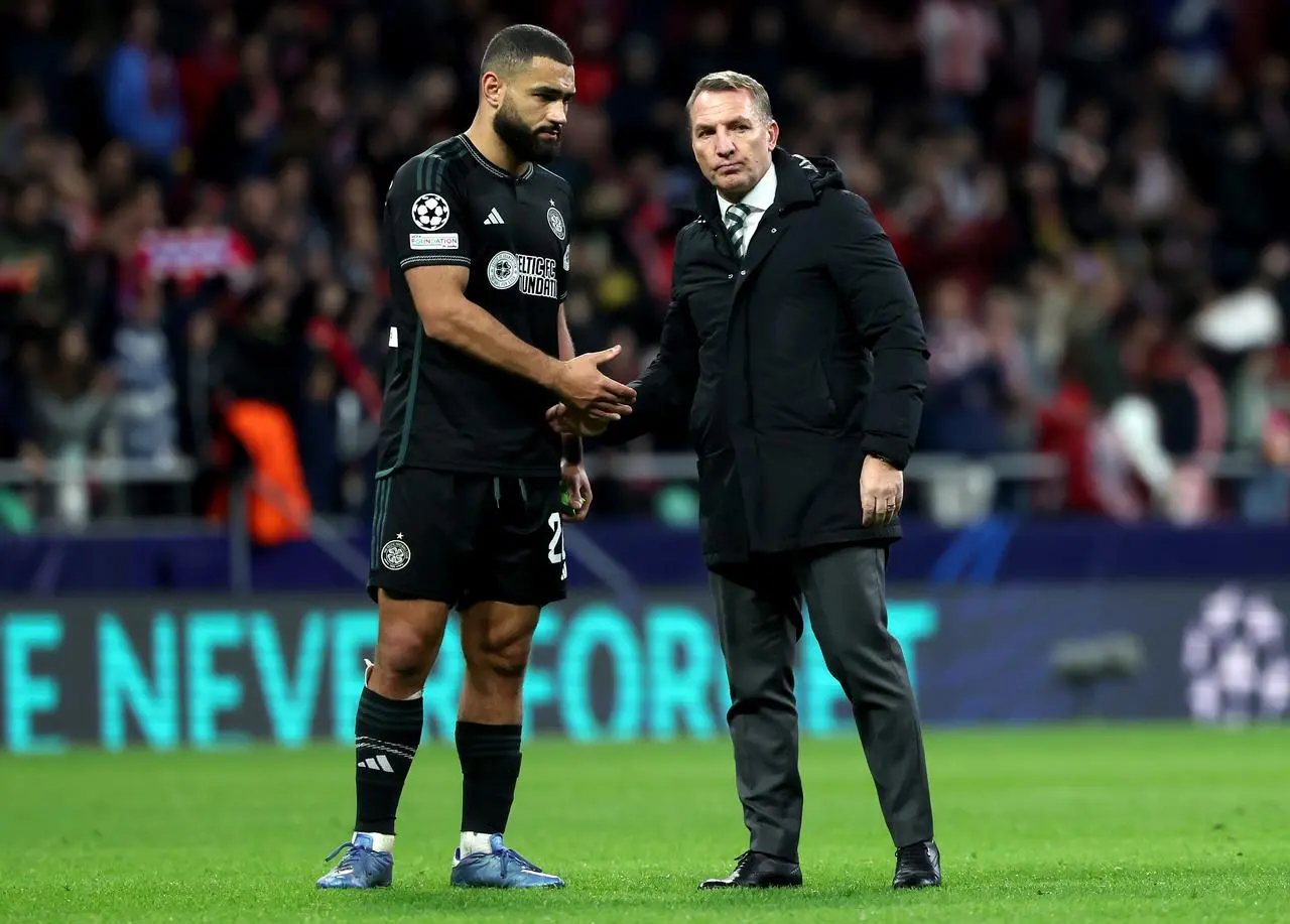 Cameron Carter-Vickers, left, talking to Brendan Rodgers
