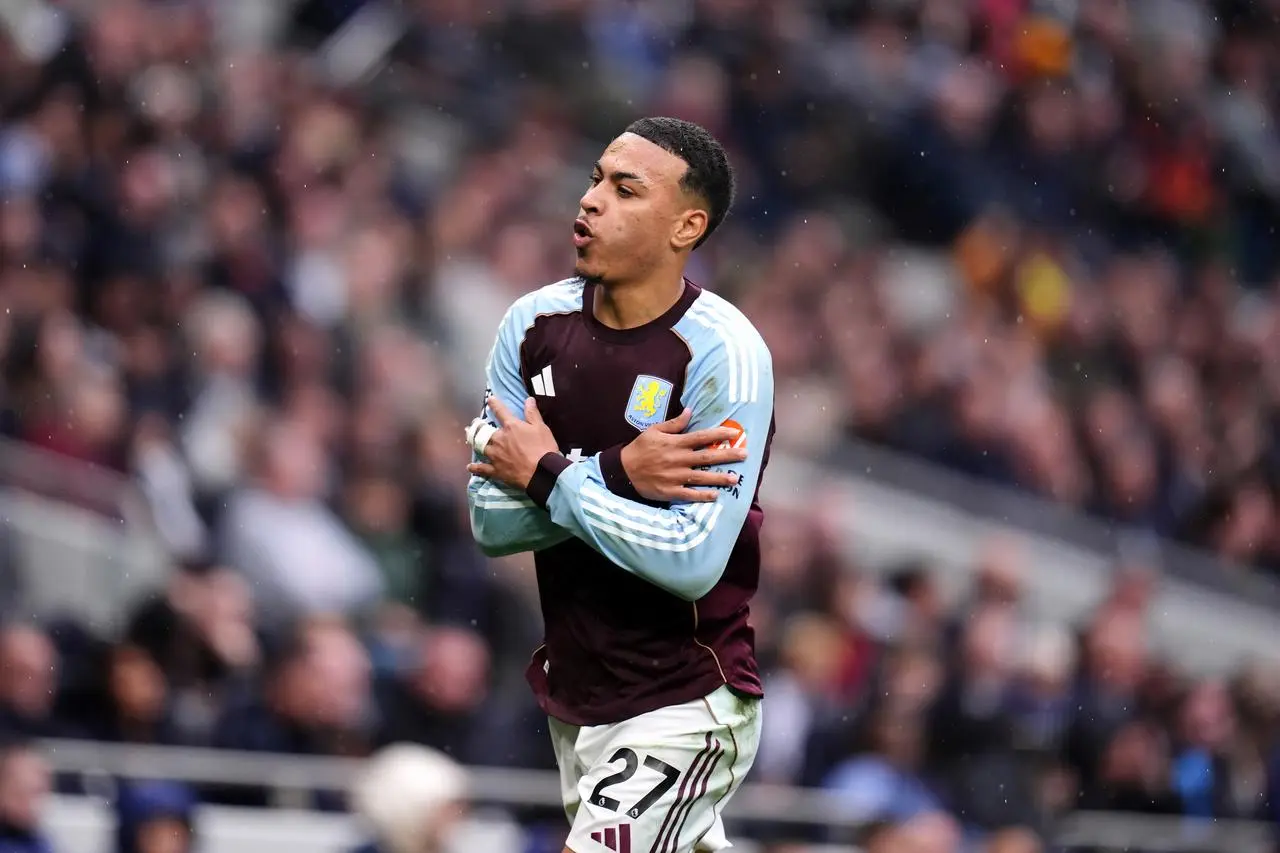 Aston Villa’s Morgan Rogers celebrates his goal against Tottenham