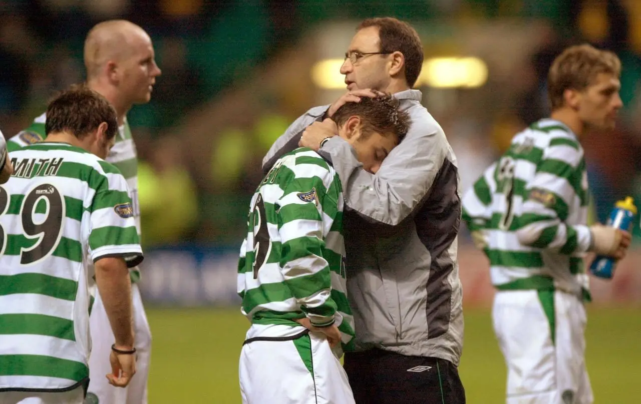 Martin O'Neill cuddles Shaun Maloney