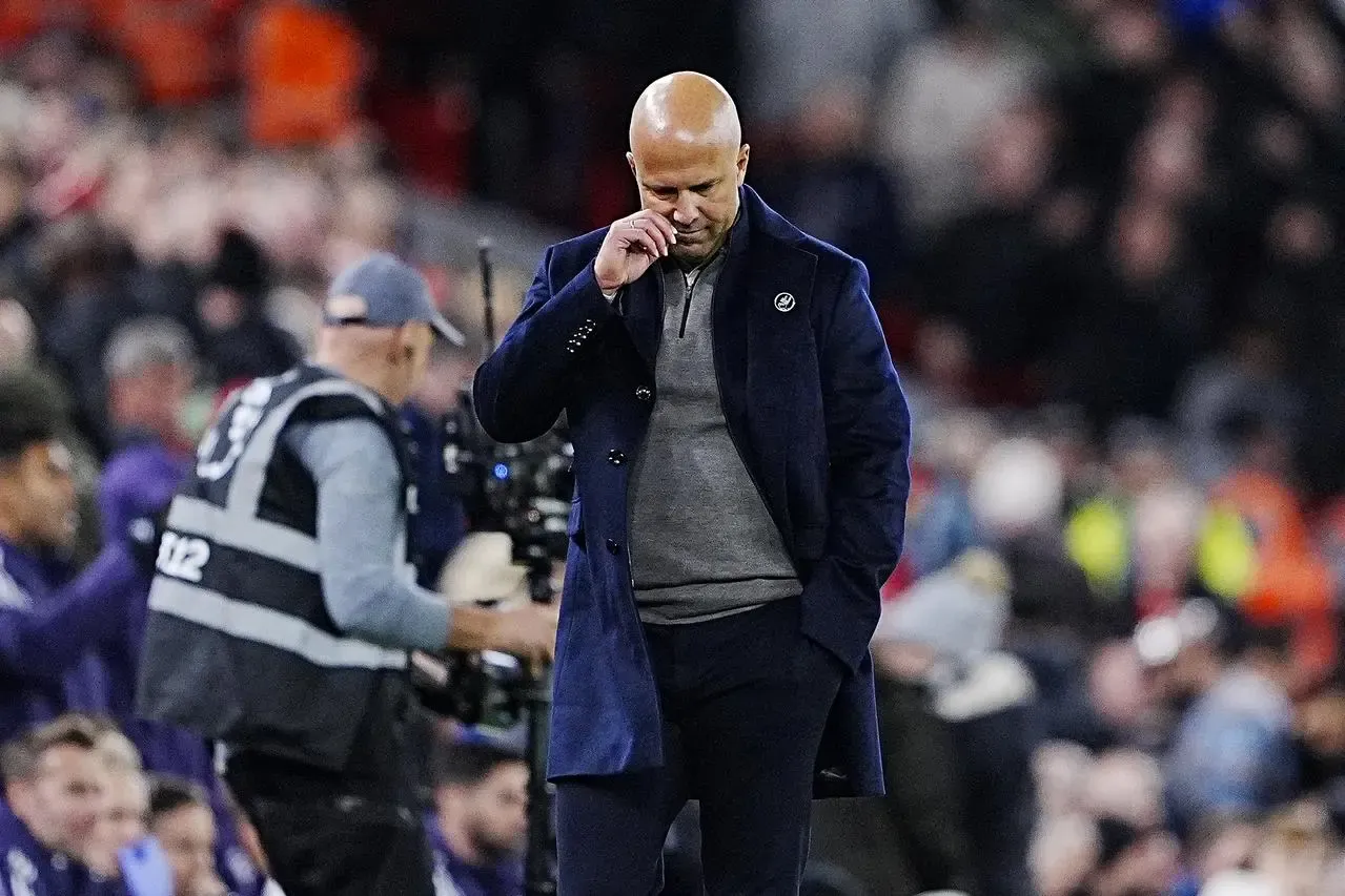 Liverpool boss Arne Slot reacts on the touchline during the Premier League defeat by Manchester United