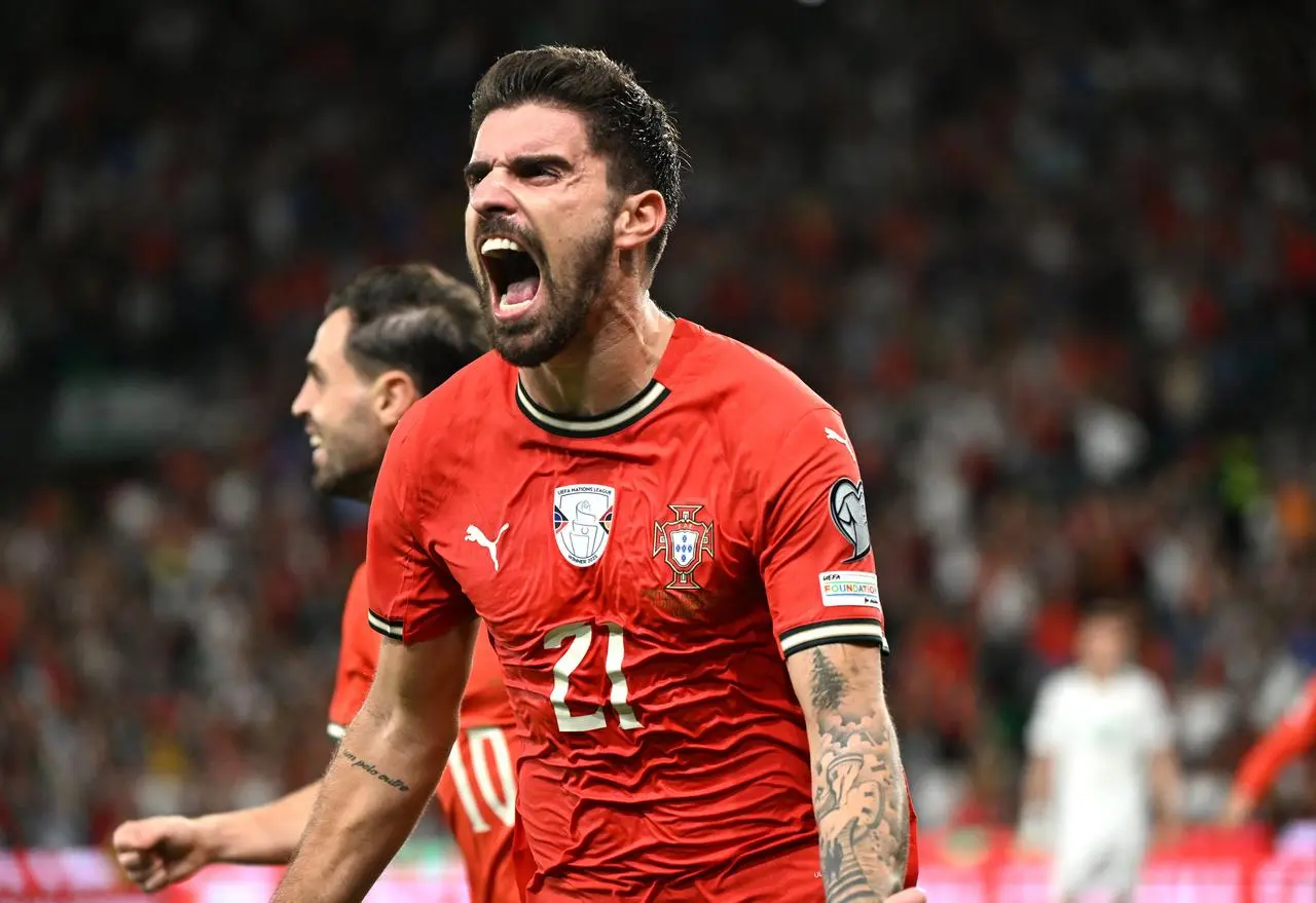 Portugal’s Ruben Neves celebrates his late winner against the Republic of Ireland
