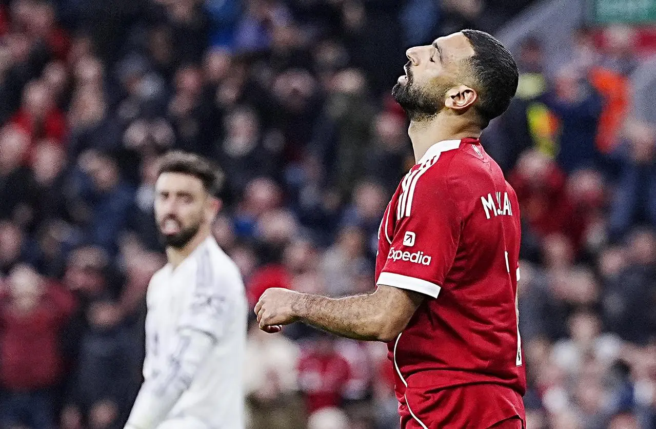 Liverpool's Mohamed Salah shows his frustration after shooting wide against Manchester United