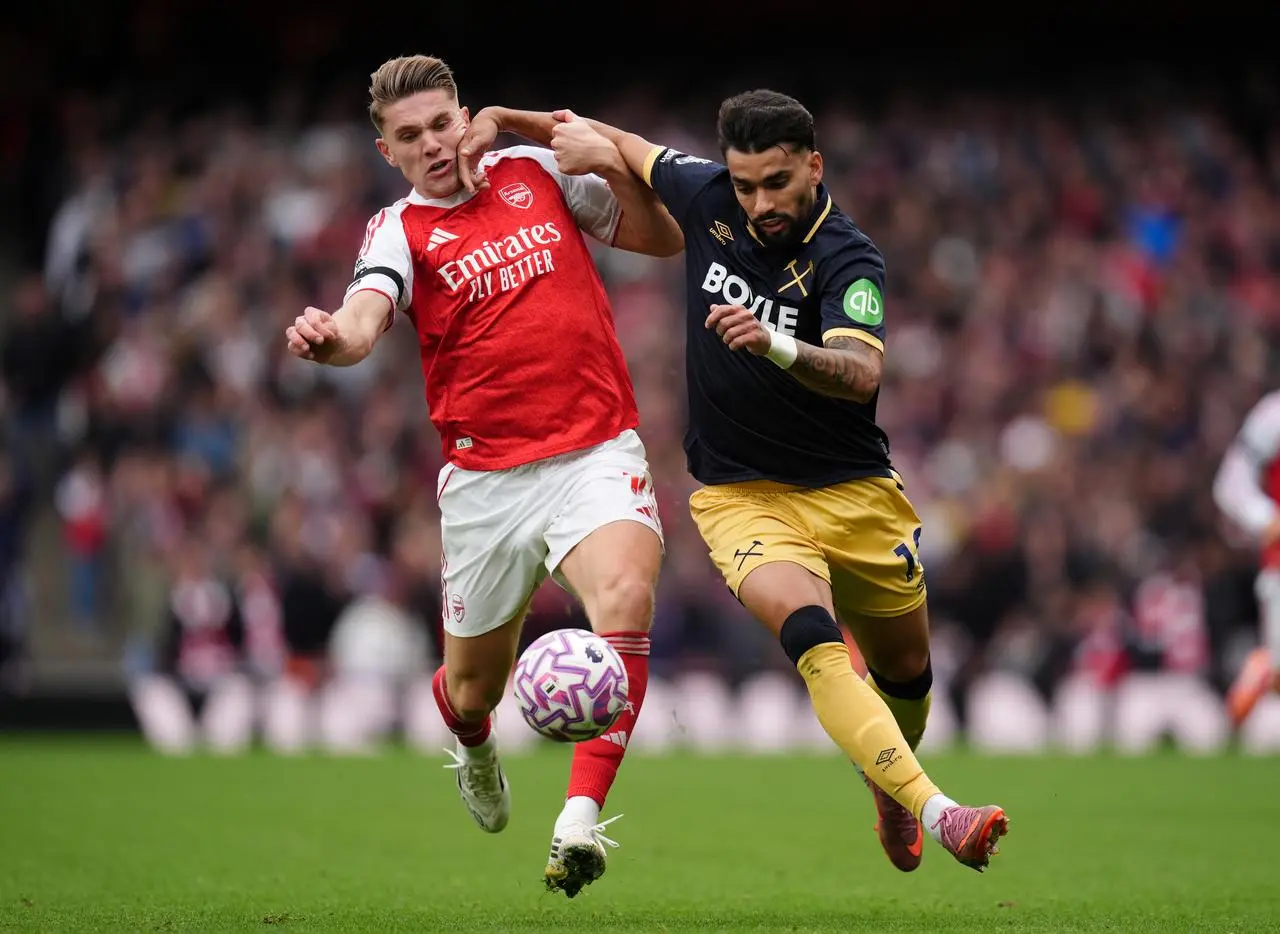 Arsenal’s Viktor Gyokeres (left) and West Ham’s Lucas Paqueta battle for the ball