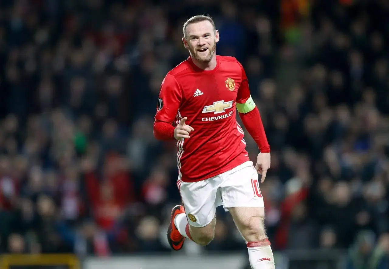Wayne Rooney celebrates after scoring for Manchester United against Feyenoord in the Europa League