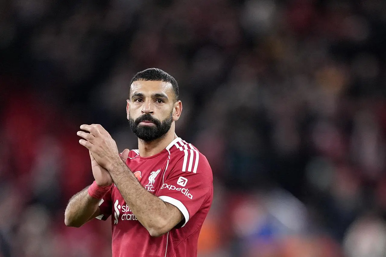 Mohamed Salah applauds the Liverpool fans after the win over Aston Villa