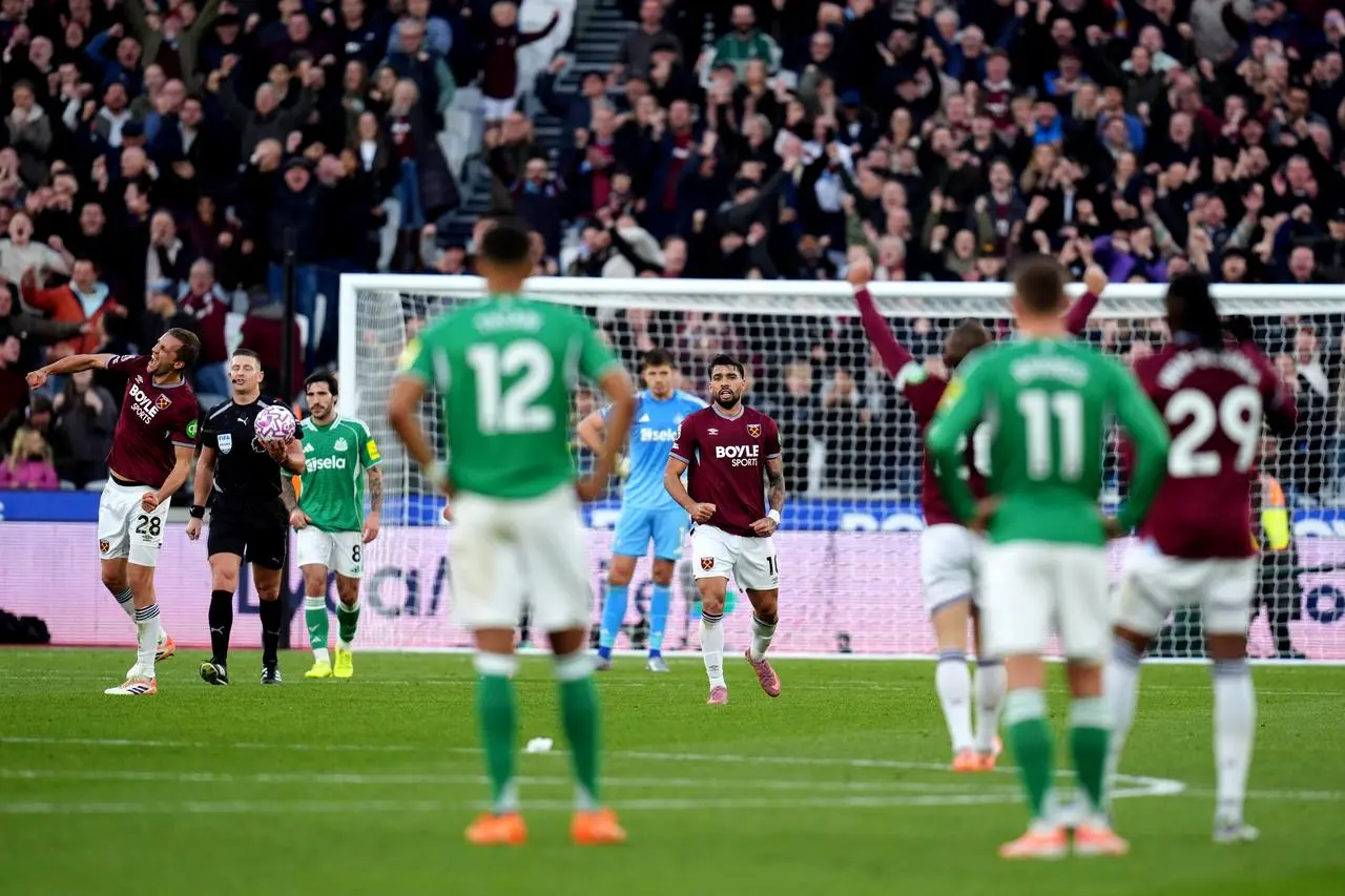 West Ham’s Tomas Soucek (left) celebrates scoring their side’s third goal of the game after a VAR review awarded the goal as teammate Lucas Paqueta (centre) celebrates during the Premier League match at the London Stadium