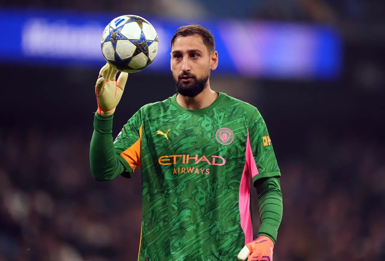 Manchester City goalkeeper Gianluigi Donnarumma with ball in hand