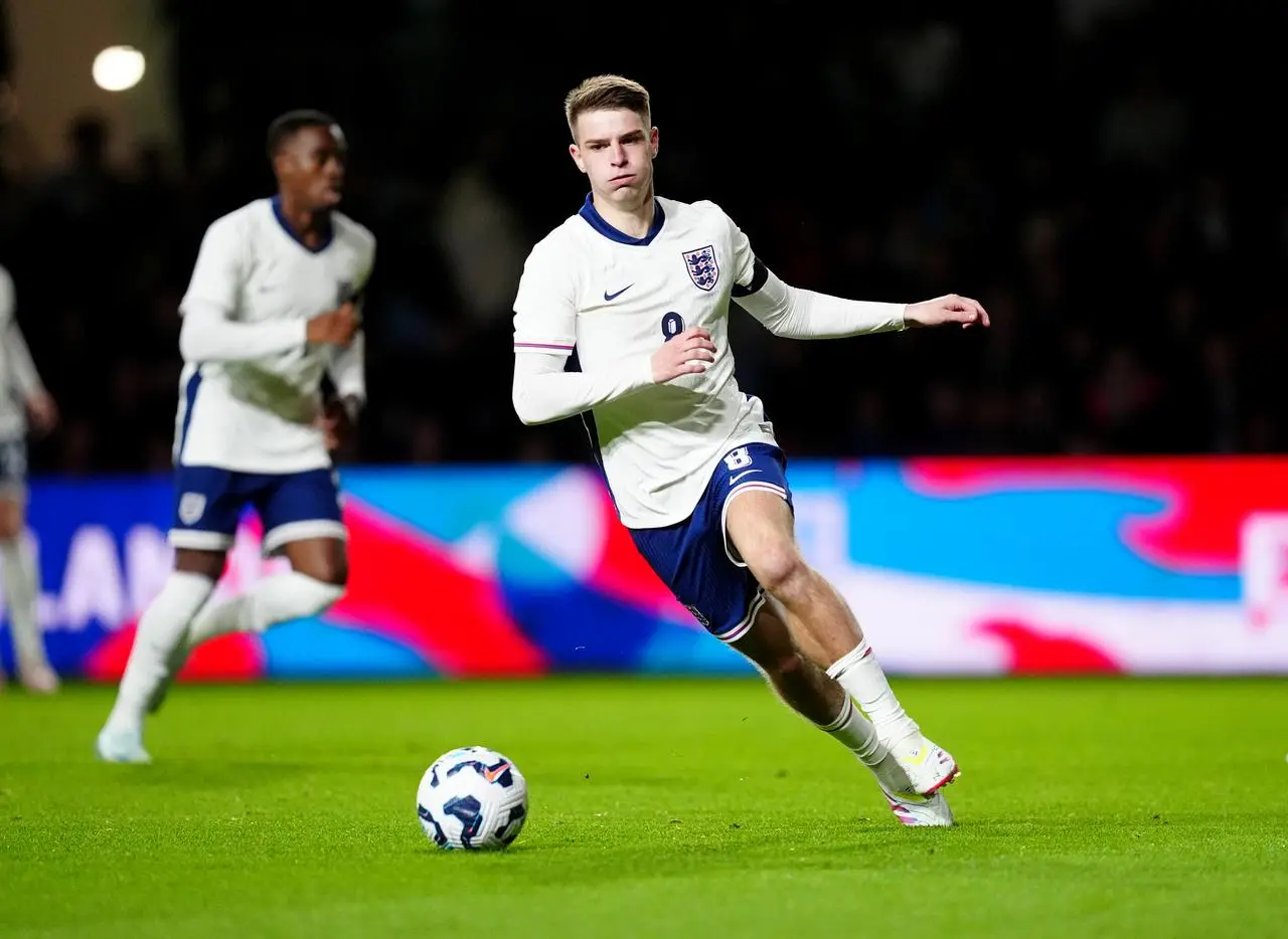 Alex Scott in action for England Under-21s