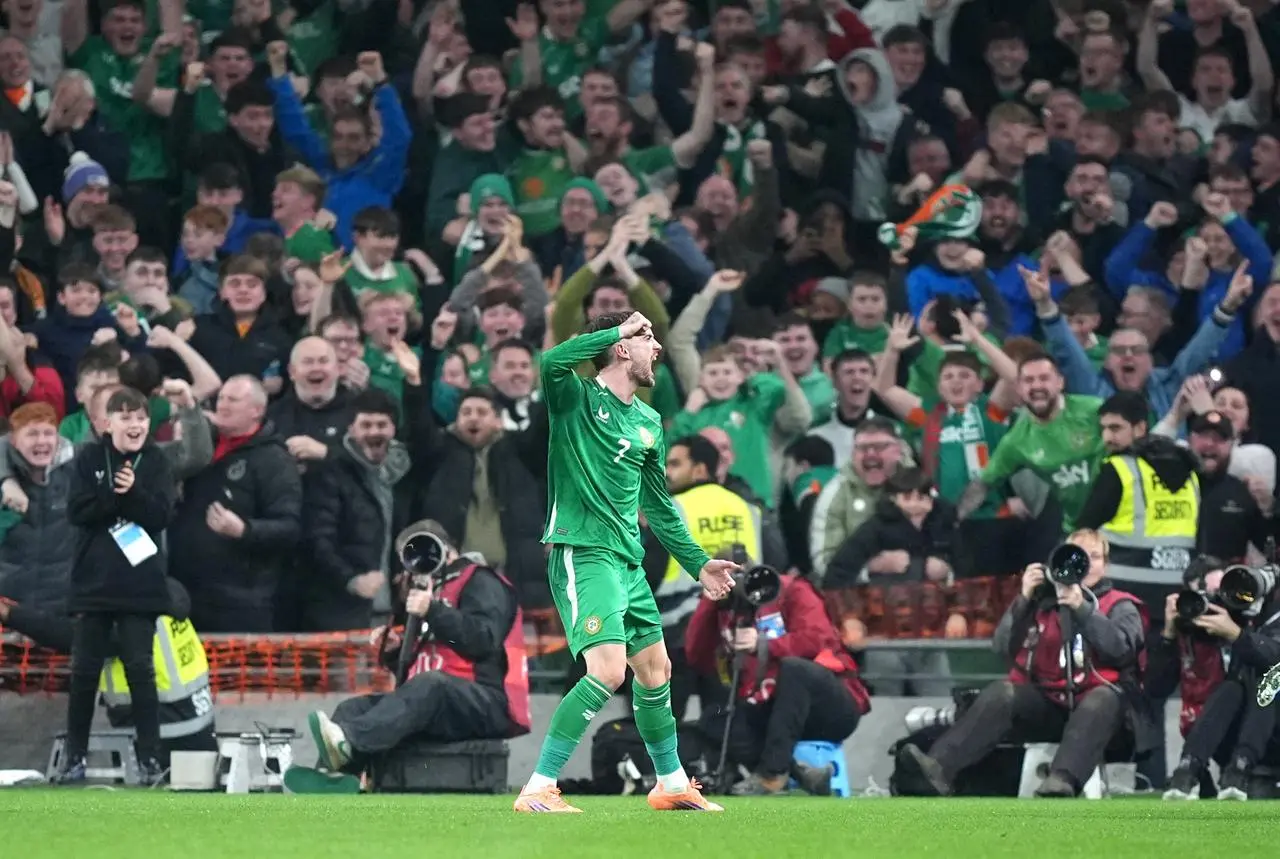 Troy Parrott celebrates in front of the Republic of Ireland fans