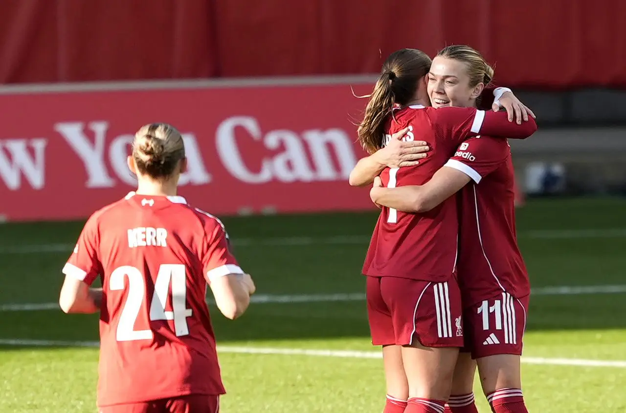Liverpool’s Beata Olsson, right, celebrates her goal