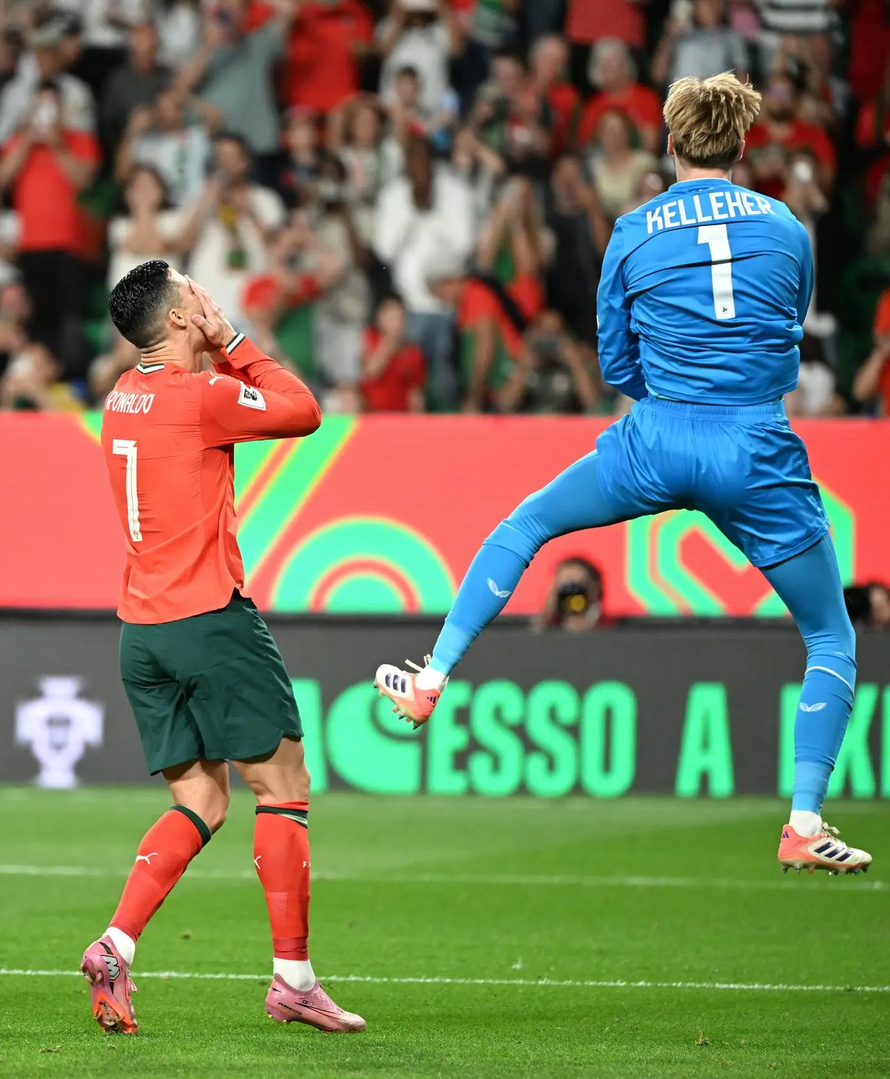 Portugal’s Cristiano Ronaldo reacts after seeing his penalty saved by Republic of Ireland keeper Caoimhin Kelleher (right)