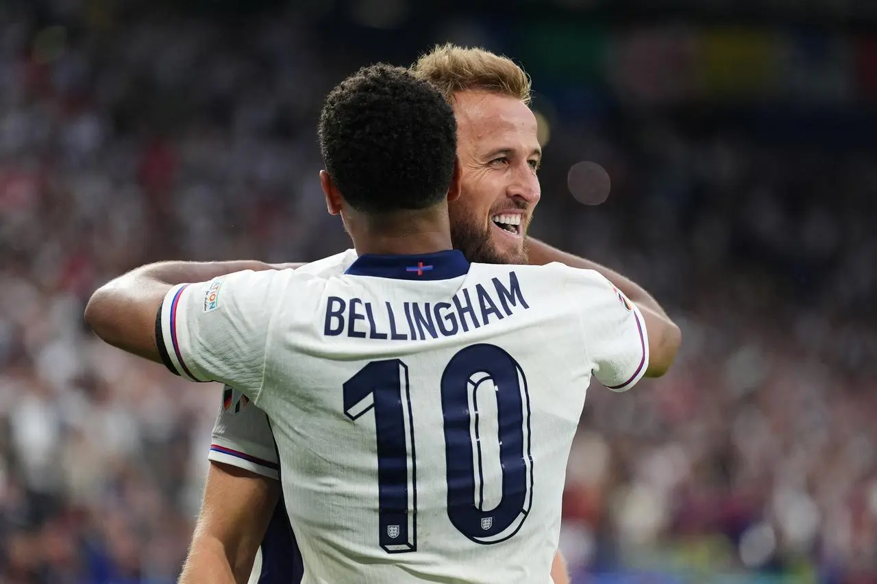 Harry Kane and Jude Bellingham embrace