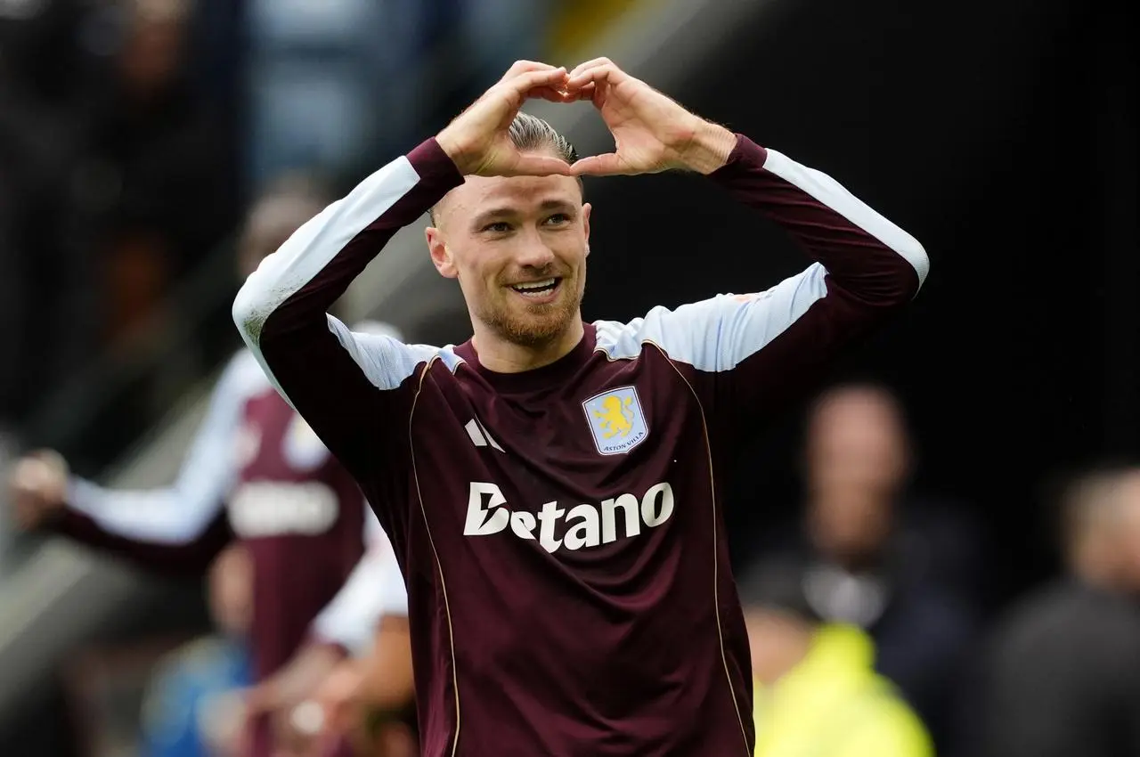 Matty Cash celebrates