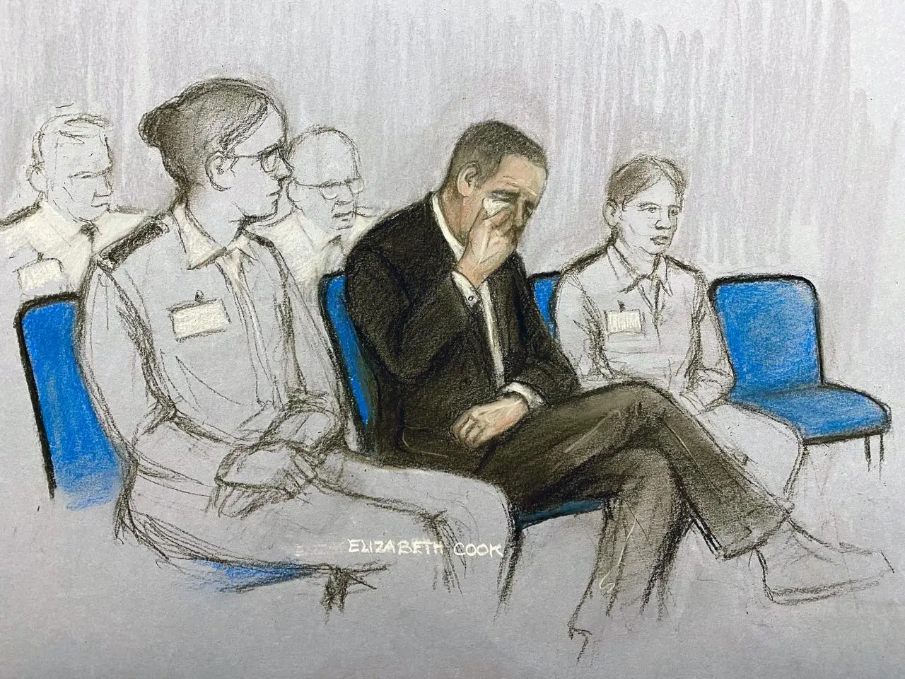 Court artist sketch by Elizabeth Cook of Paul Doyle, wiping away tears as he appears at Liverpool Crown Court