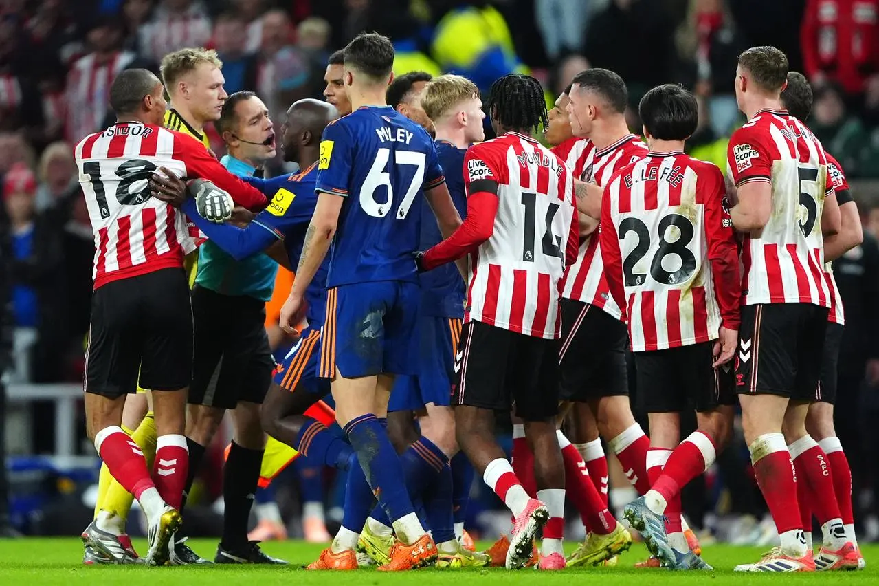 Sunderland and Newcastle players tussle