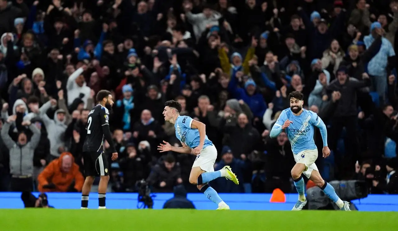 Manchester City’s Phil Foden celebrates scoring a late winner against Leeds