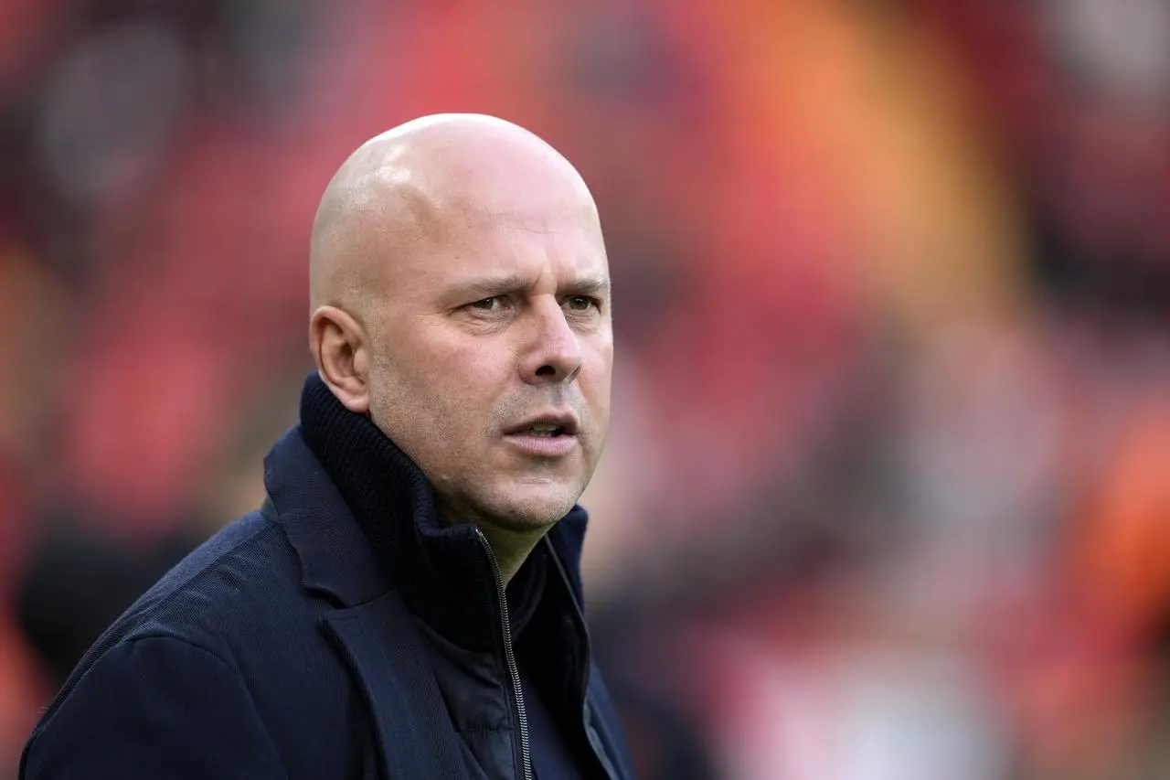 Liverpool manager Arne Slot on the touchline before a game at Anfield