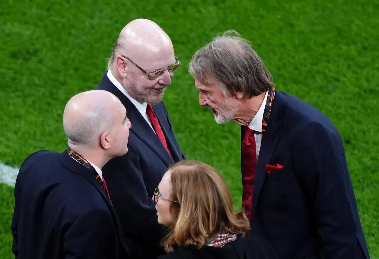 Sir Jim Ratcliffe and Avram Glazer converse