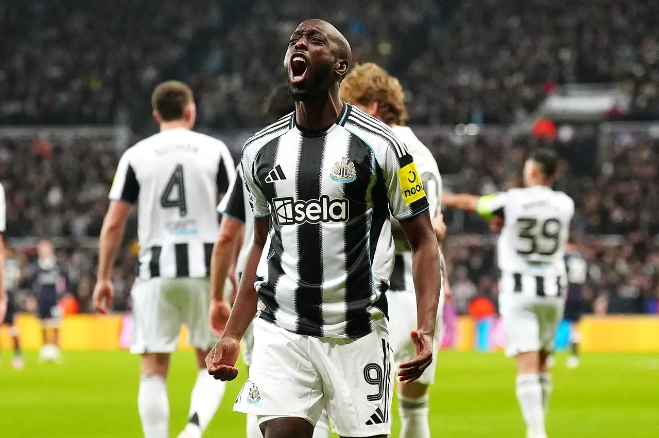 Newcastle United’s Yoane Wissa celebrates scoring against PSV Eindhoven
