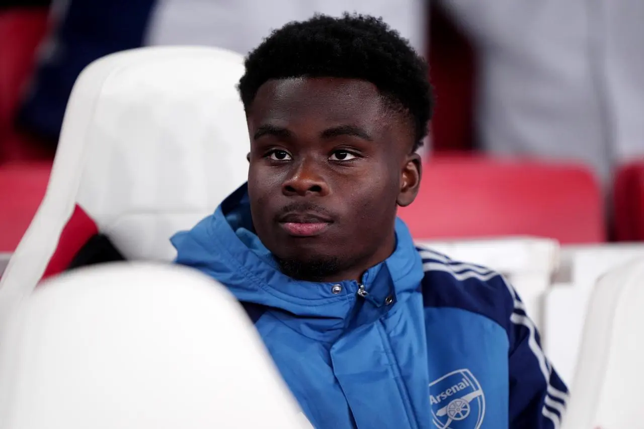 Bukayo Saka sat on the bench