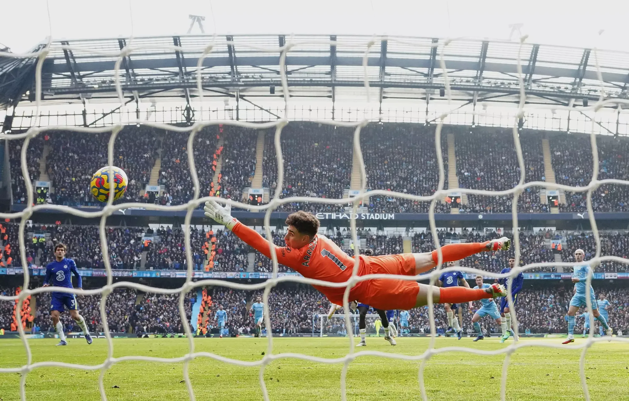 Kevin De Bruyne's shot is out of reach for the Chelsea goalkeeper Kepa Arrizabalaga