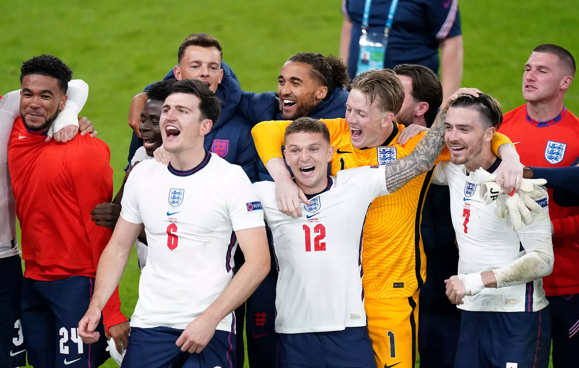 Kieran Trippier, centre, celebrates England’s Euro 2020 semi-final victory over Denmark with his team-mates