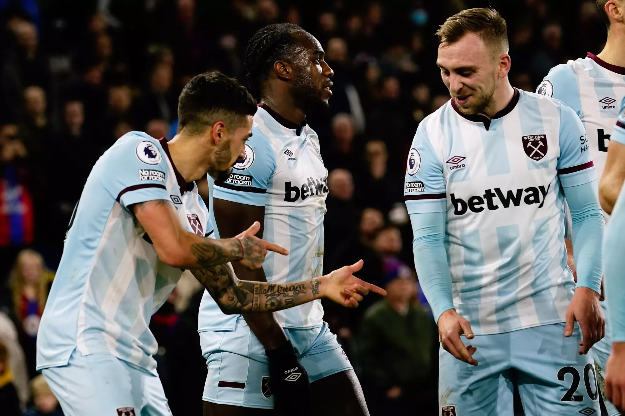 Lanzini celebrates with Jarrod Bowen after making it 3-0 against Palace