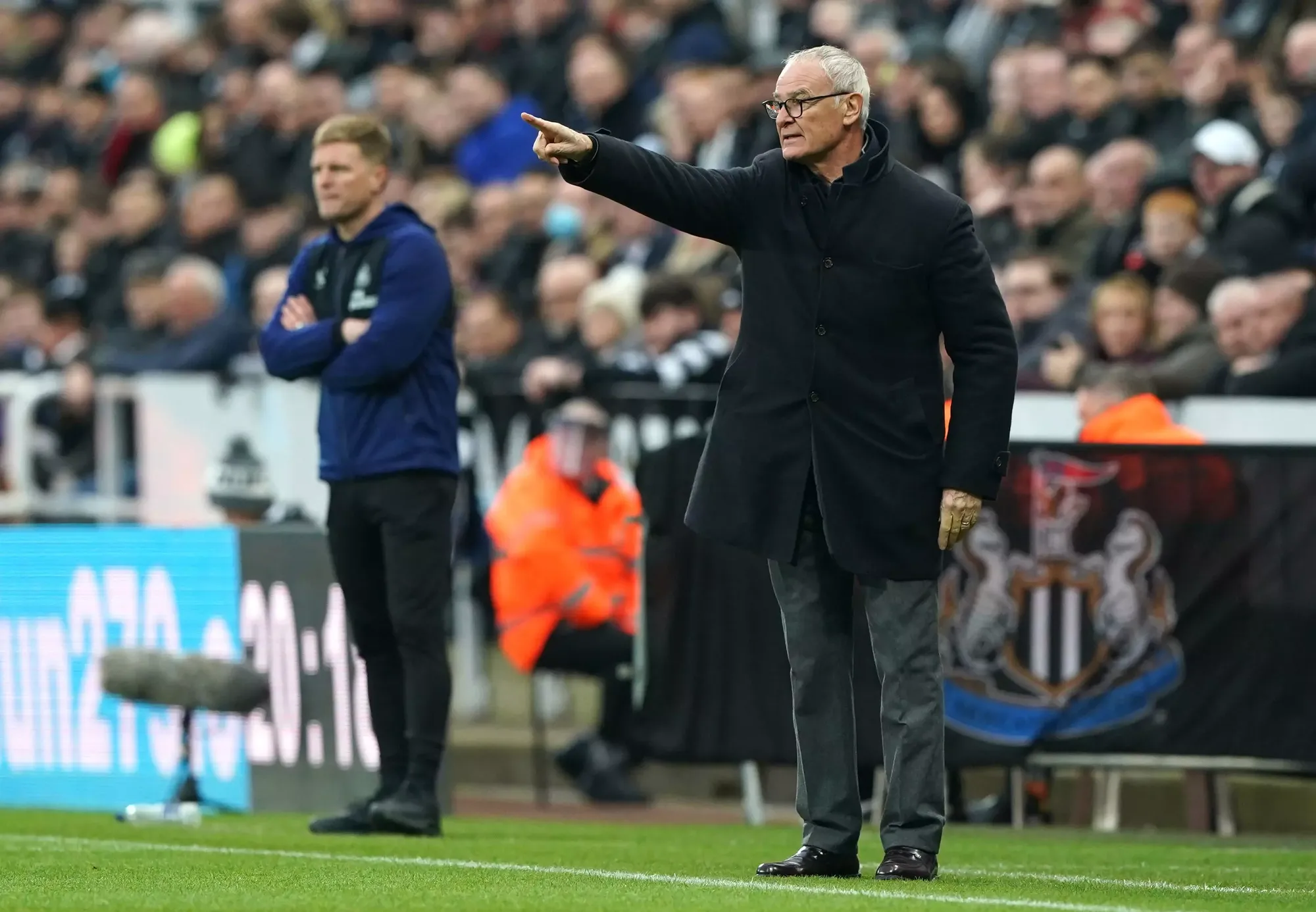 Newcastle manager Eddie Howe watches on as Claudio Ranieri issues instruction to his Watford players