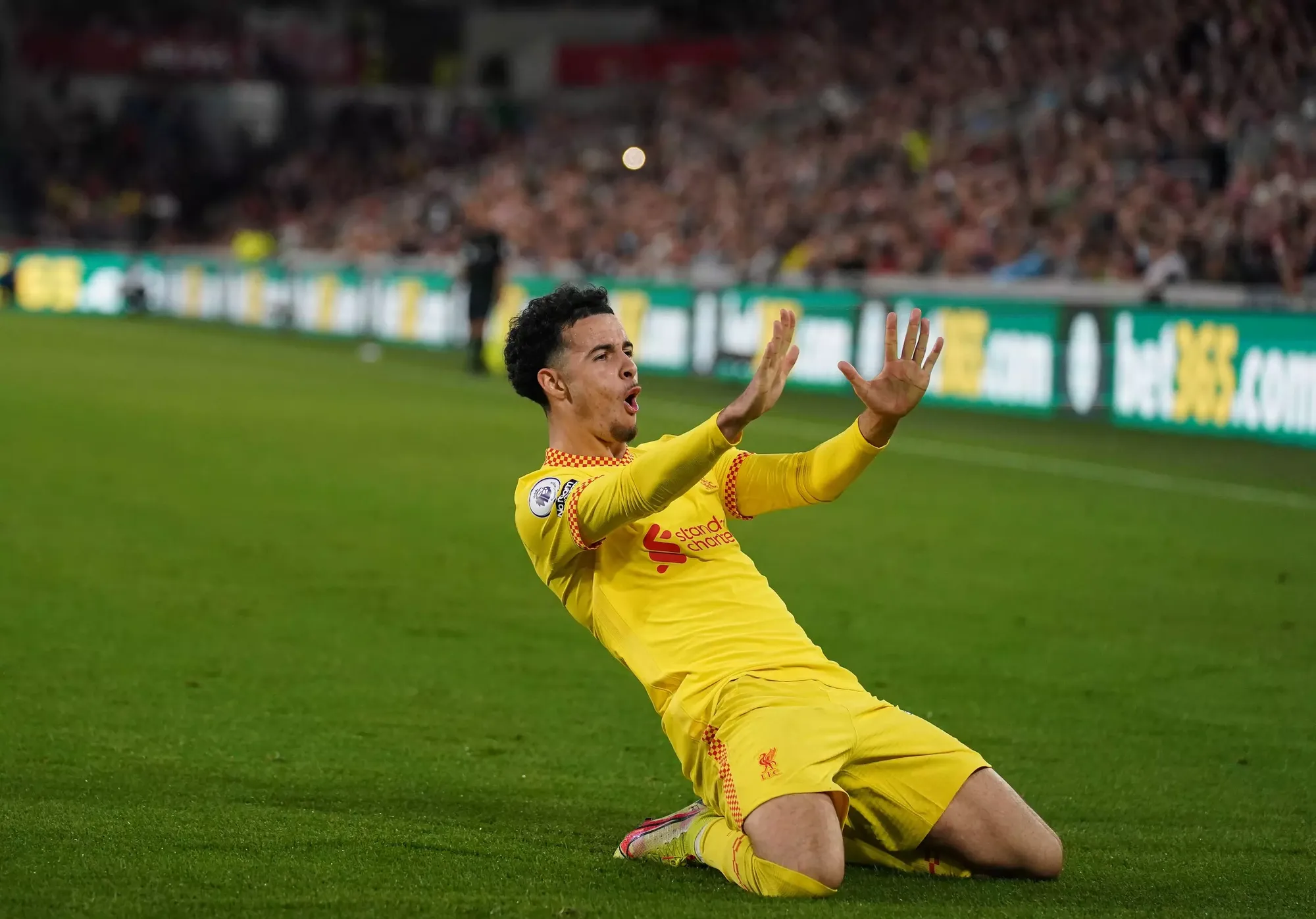 Curtis Jones celebrates after scoring for Liverpool