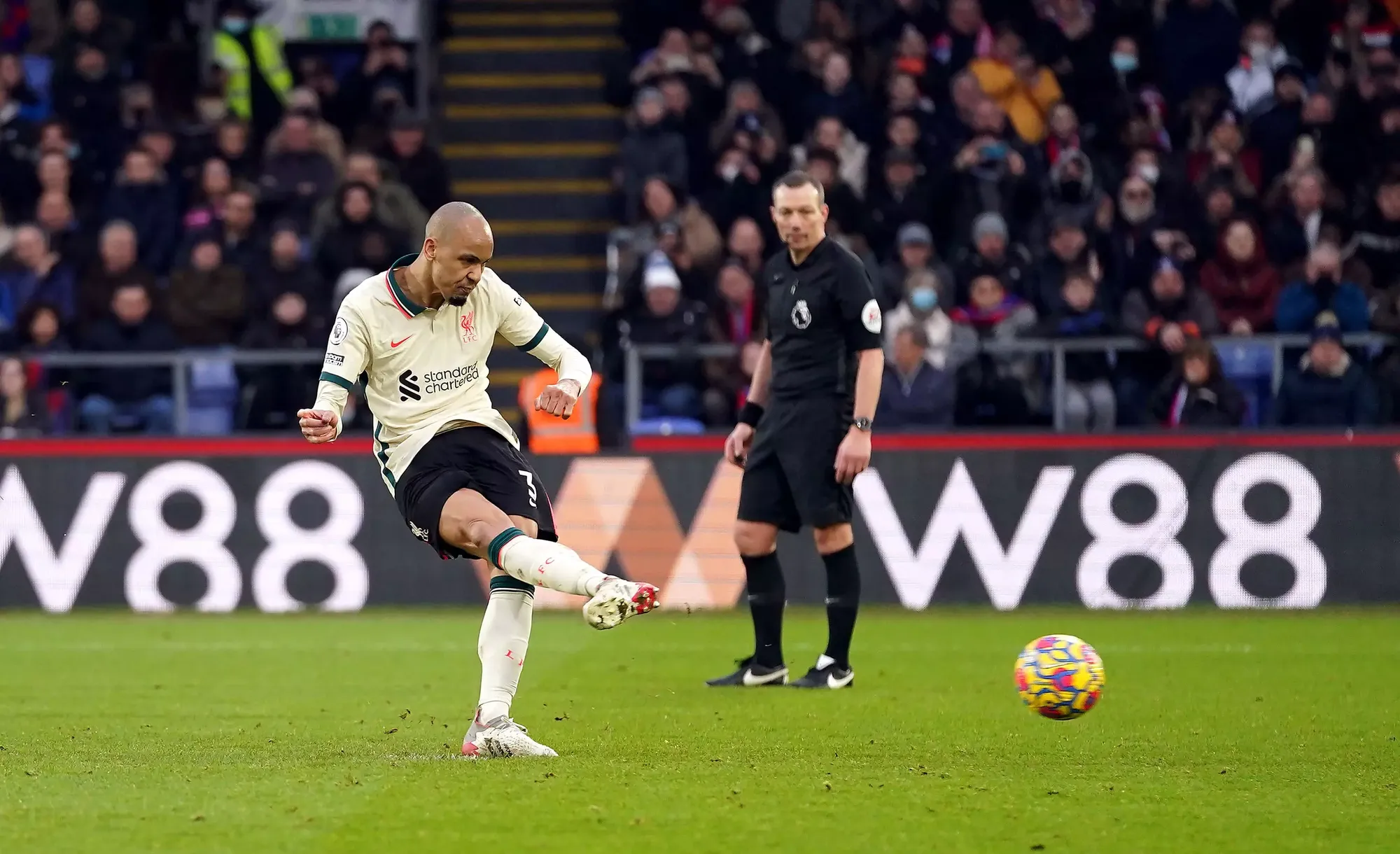 Liverpool's Fabinho slots home the penalty kick against Crystal Palace