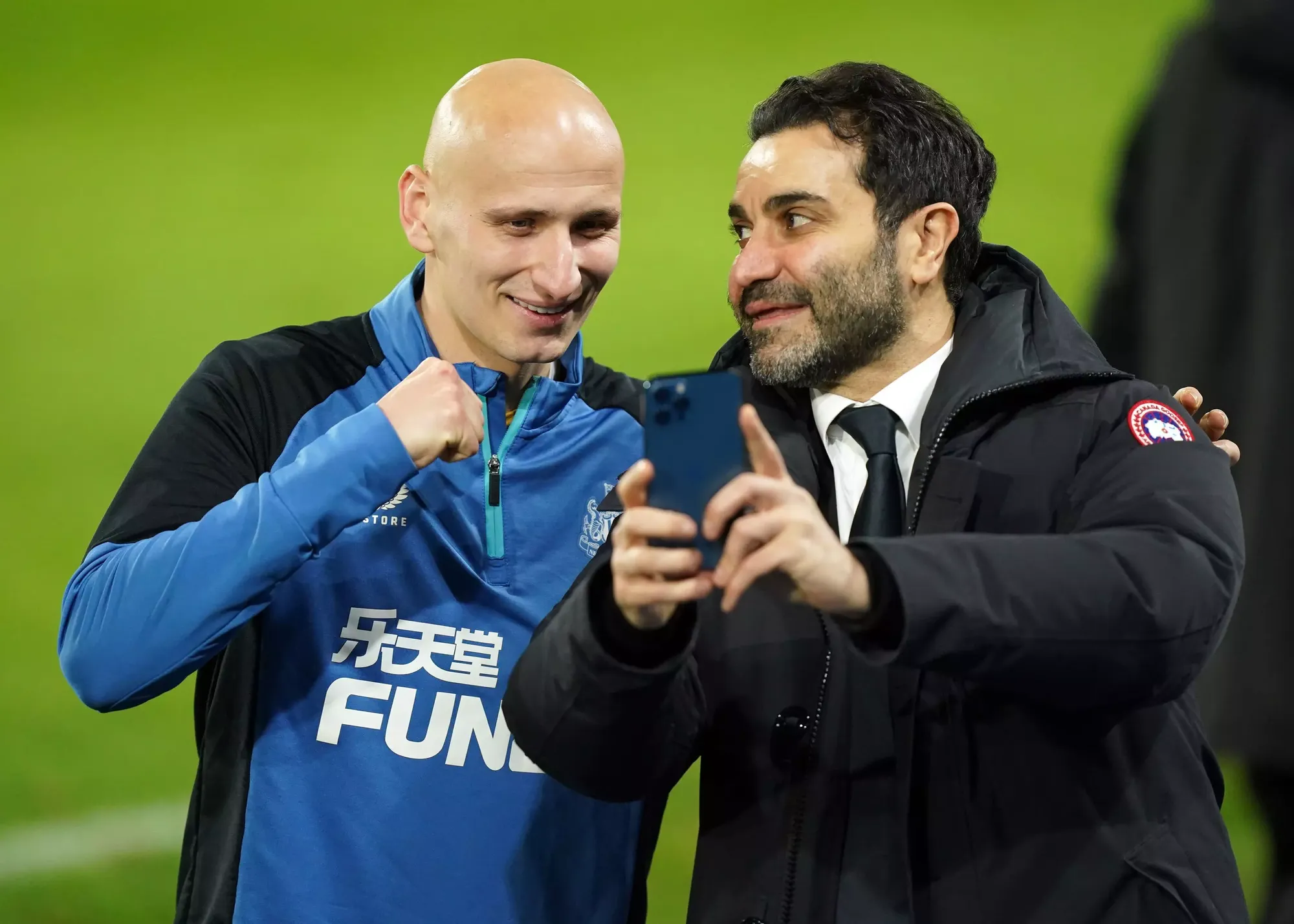 Match winner Jonjo Shelveys laughs with Newcastle United owner Mehrdad Ghodoussi 